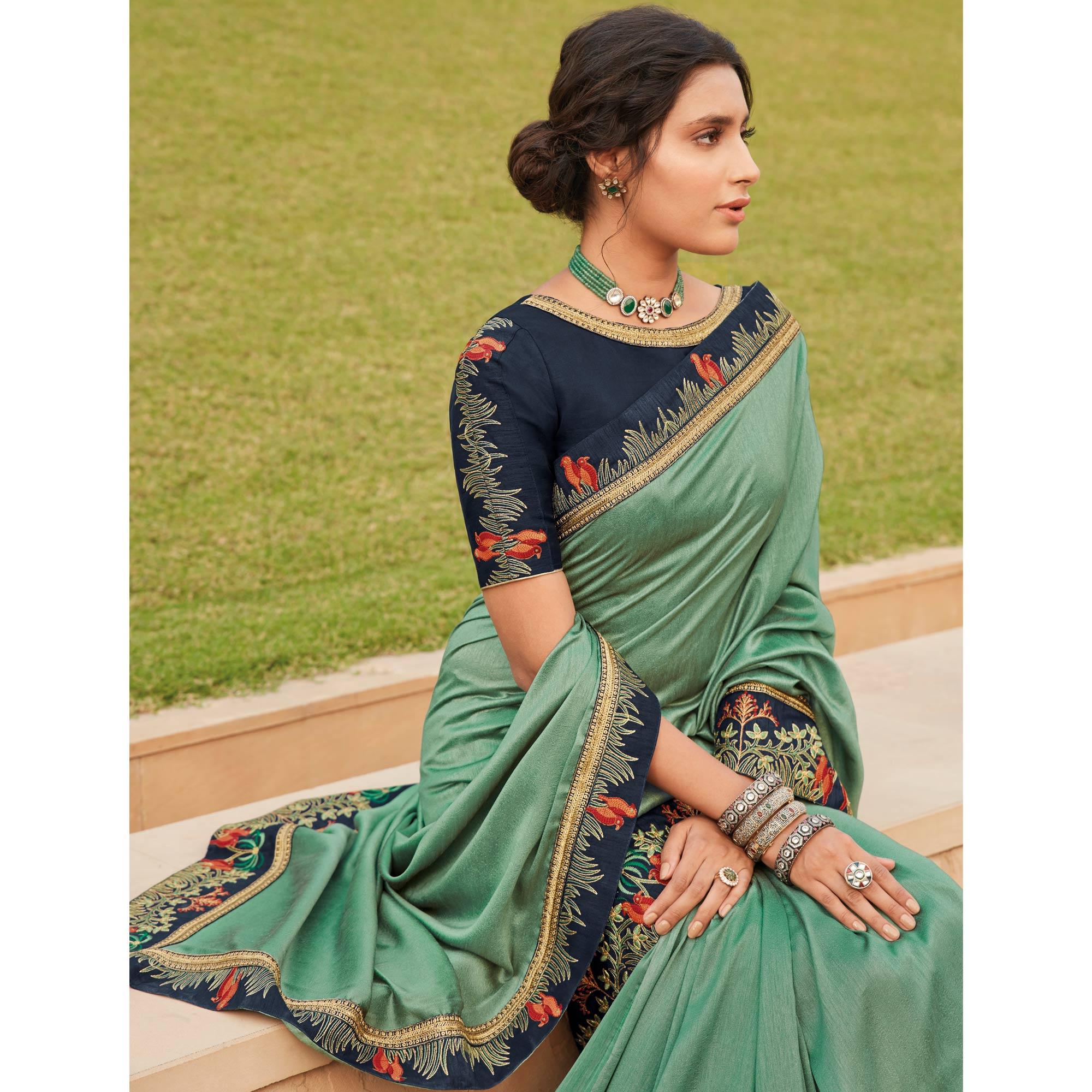 Green Festive Wear Woven Silk Saree With Border - Peachmode