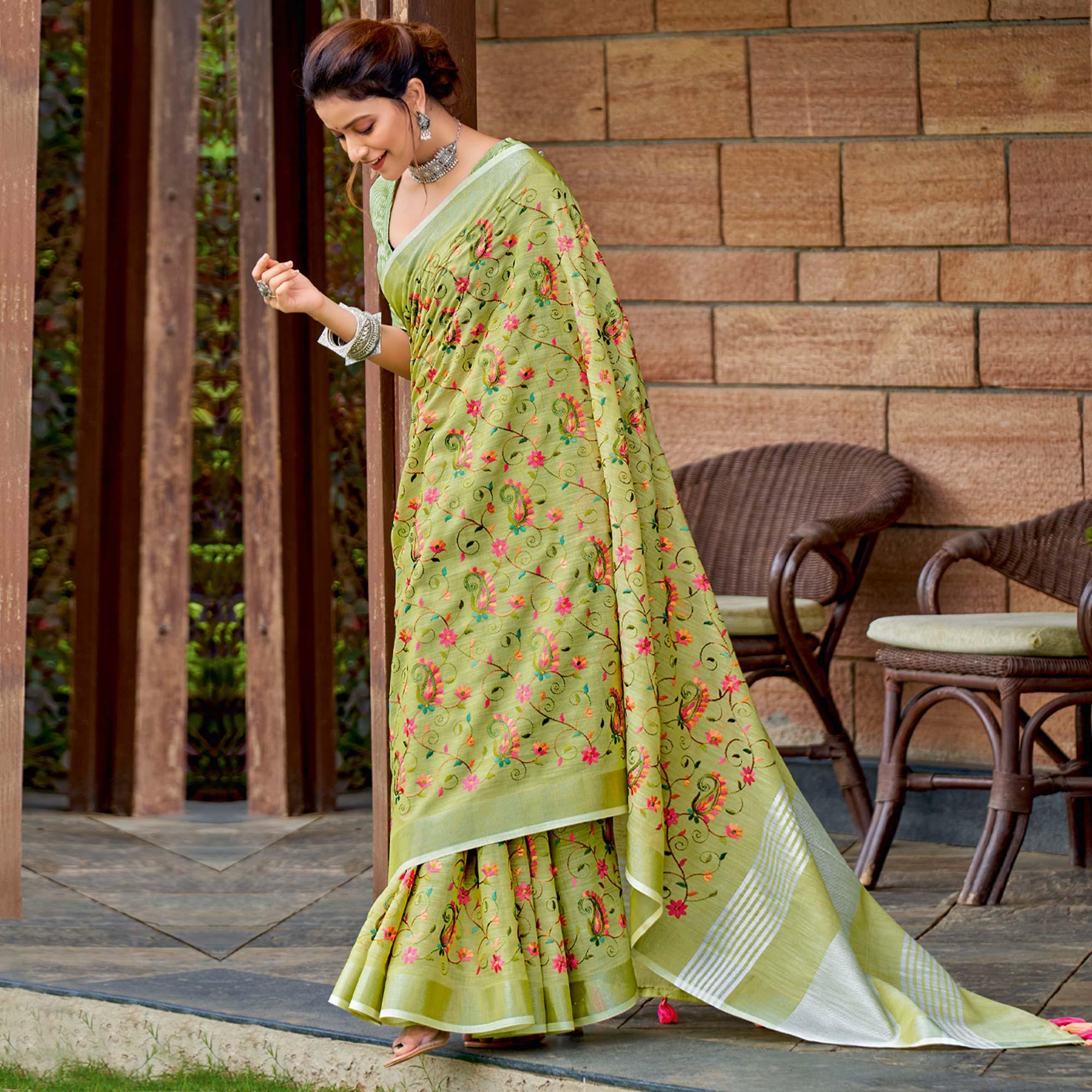 Green Floral Embroidered Linen Saree With Tassels - Peachmode