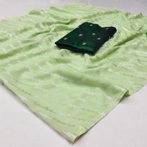 Green Foil Printed Georgette Saree - Peachmode