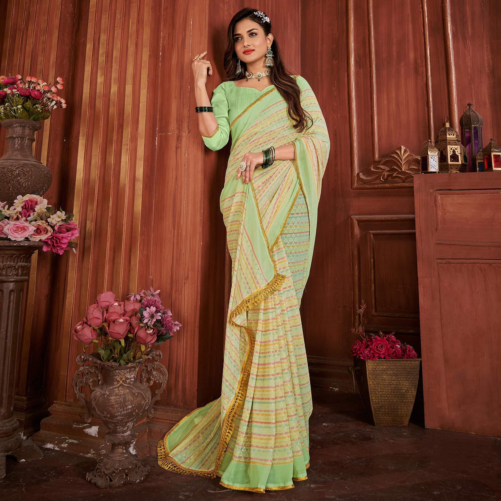 Green Foil Printed Georgette Saree - Peachmode