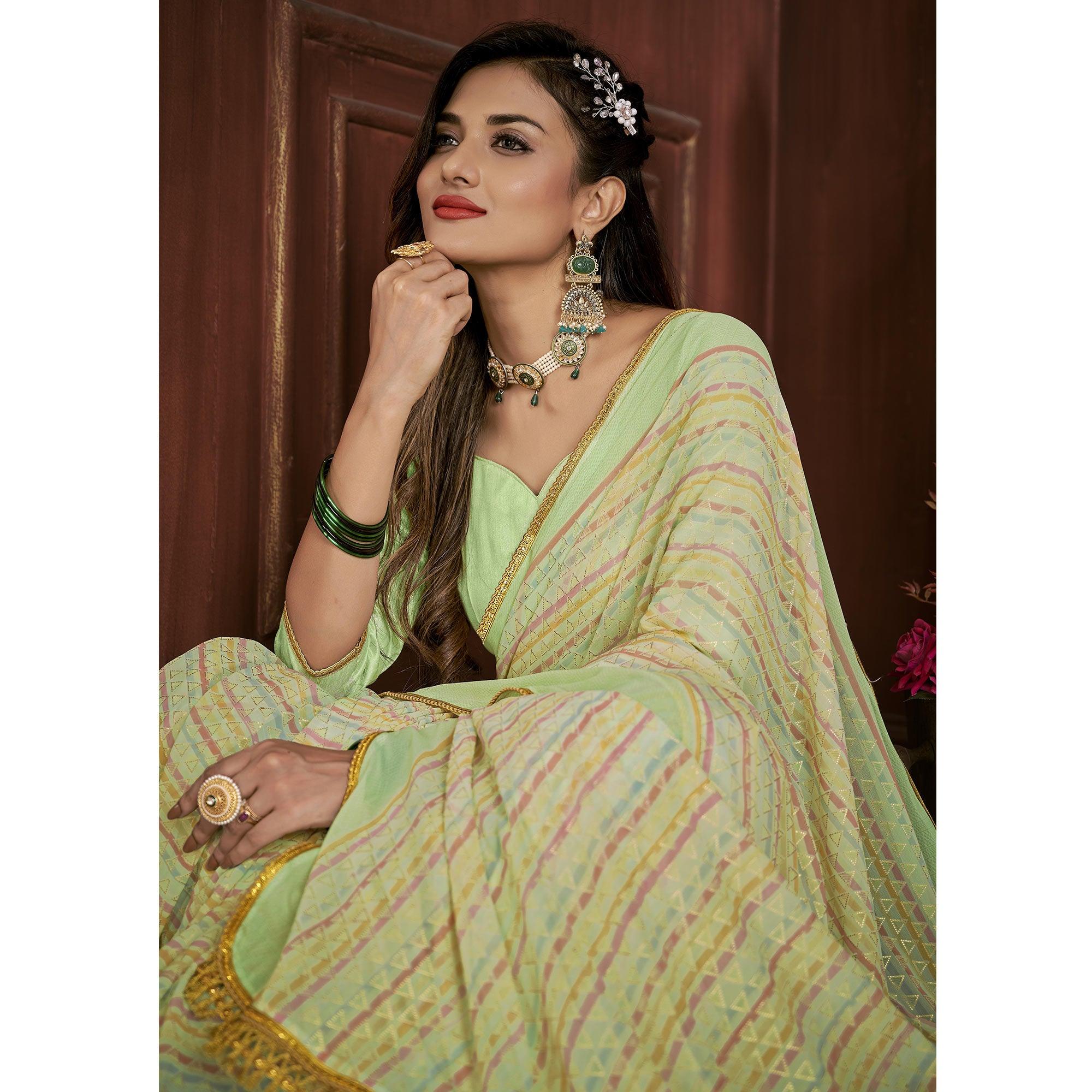 Green Foil Printed Georgette Saree - Peachmode