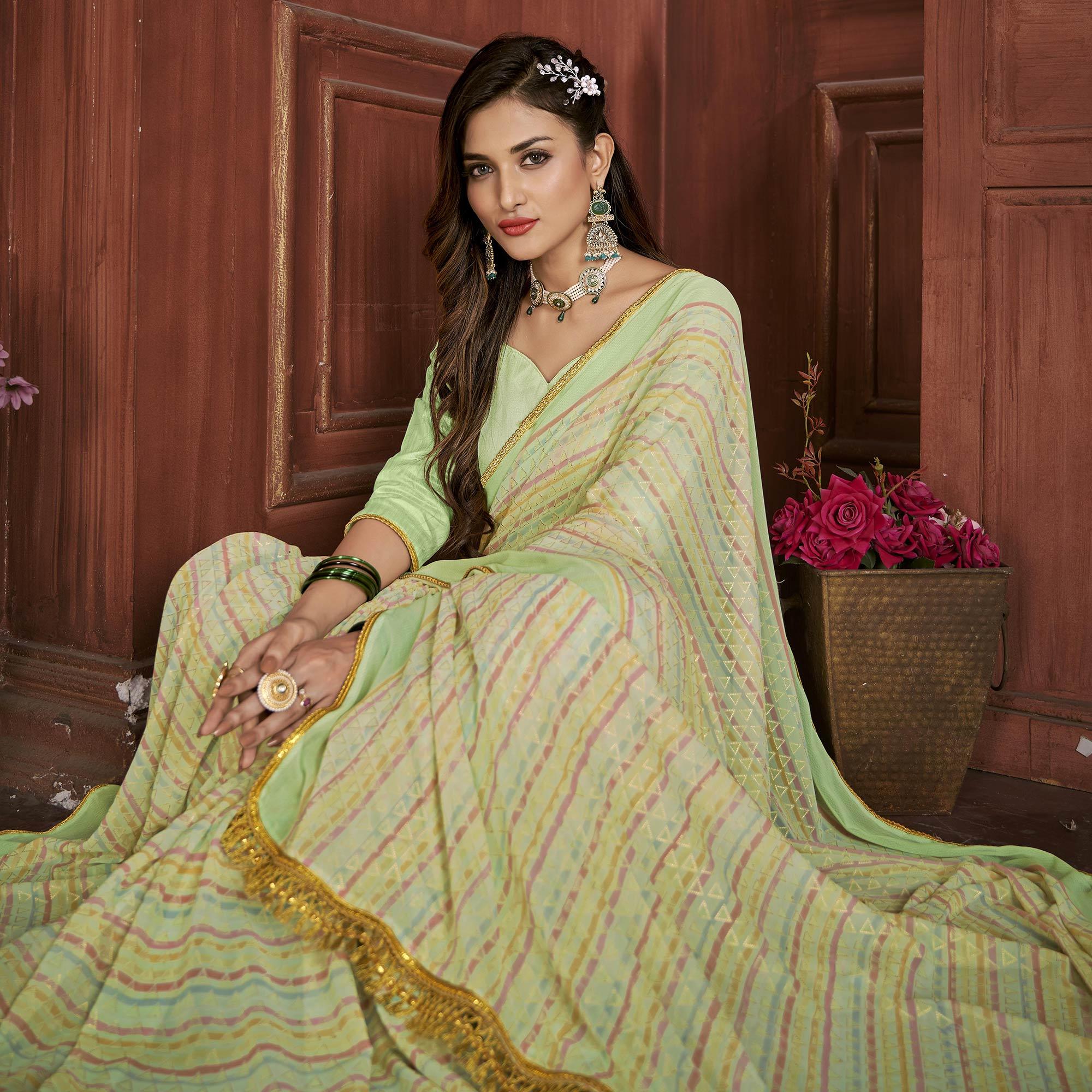 Green Foil Printed Georgette Saree - Peachmode