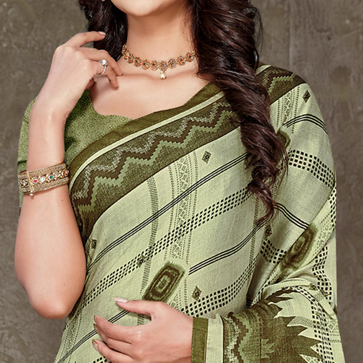 Green Geometric Printed Chiffon Saree With Tassels - Peachmode