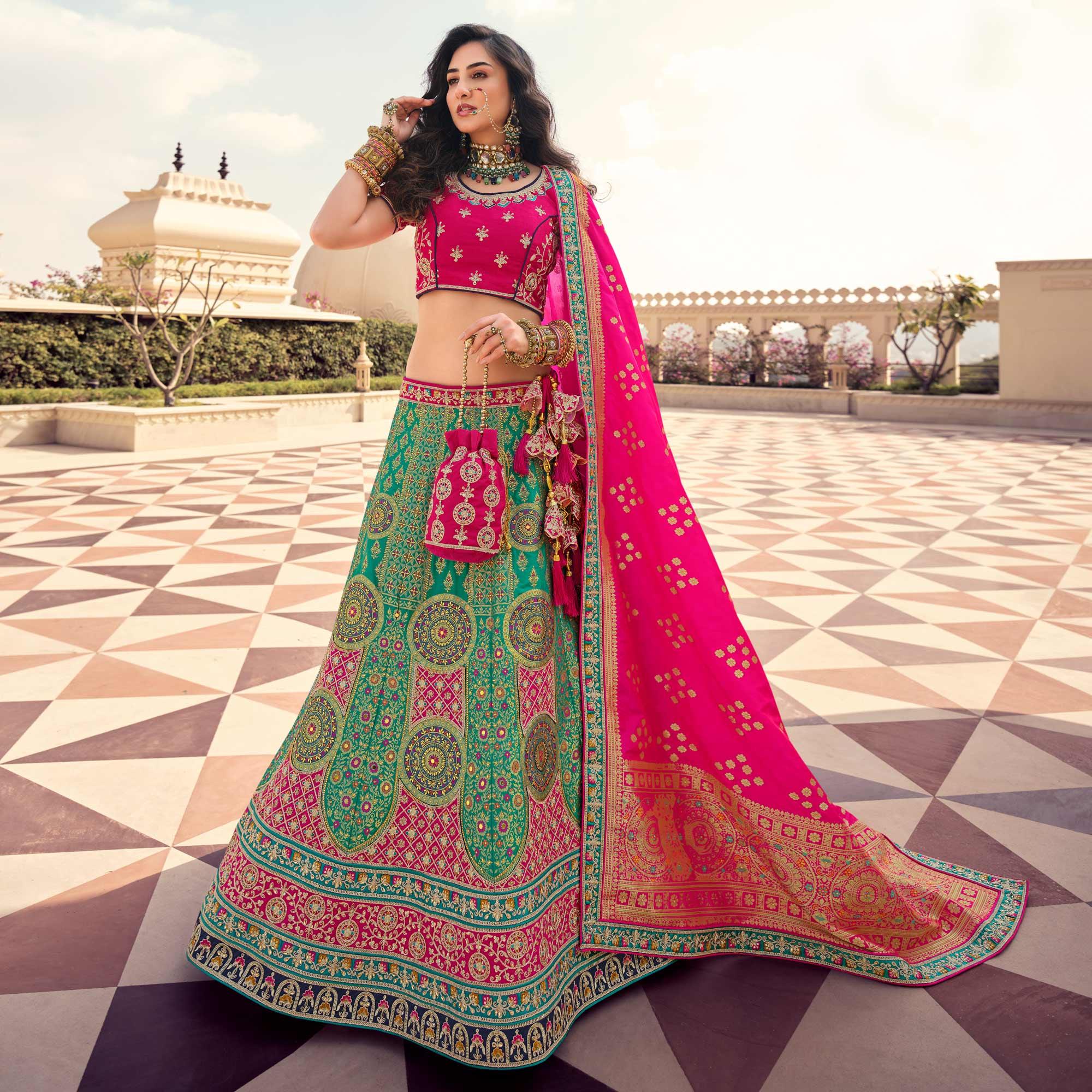 Green Partywear Embellished Embroidered Banarasi Silk Lehenga - Peachmode