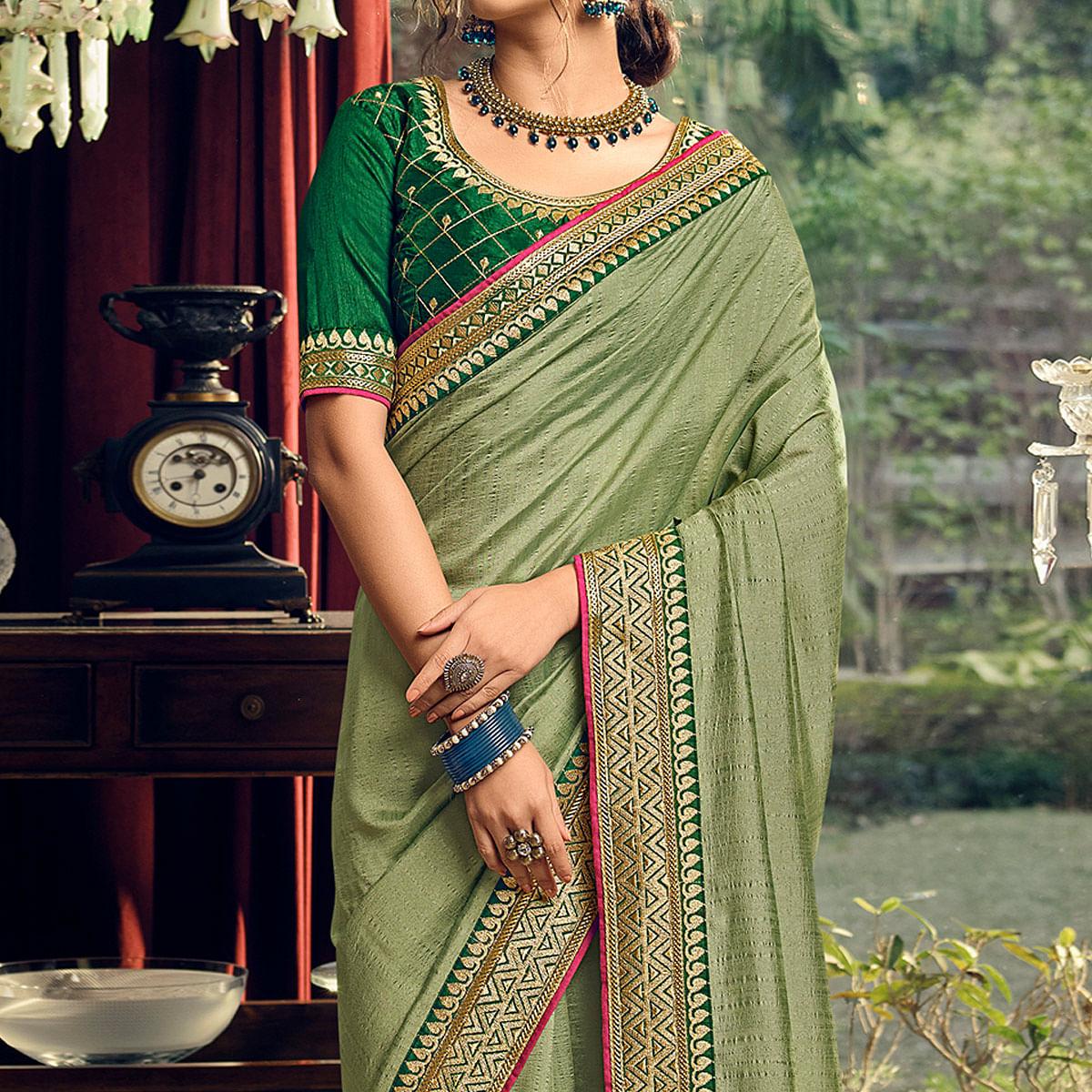 Green Partywear Embroidered Silk Saree - Peachmode