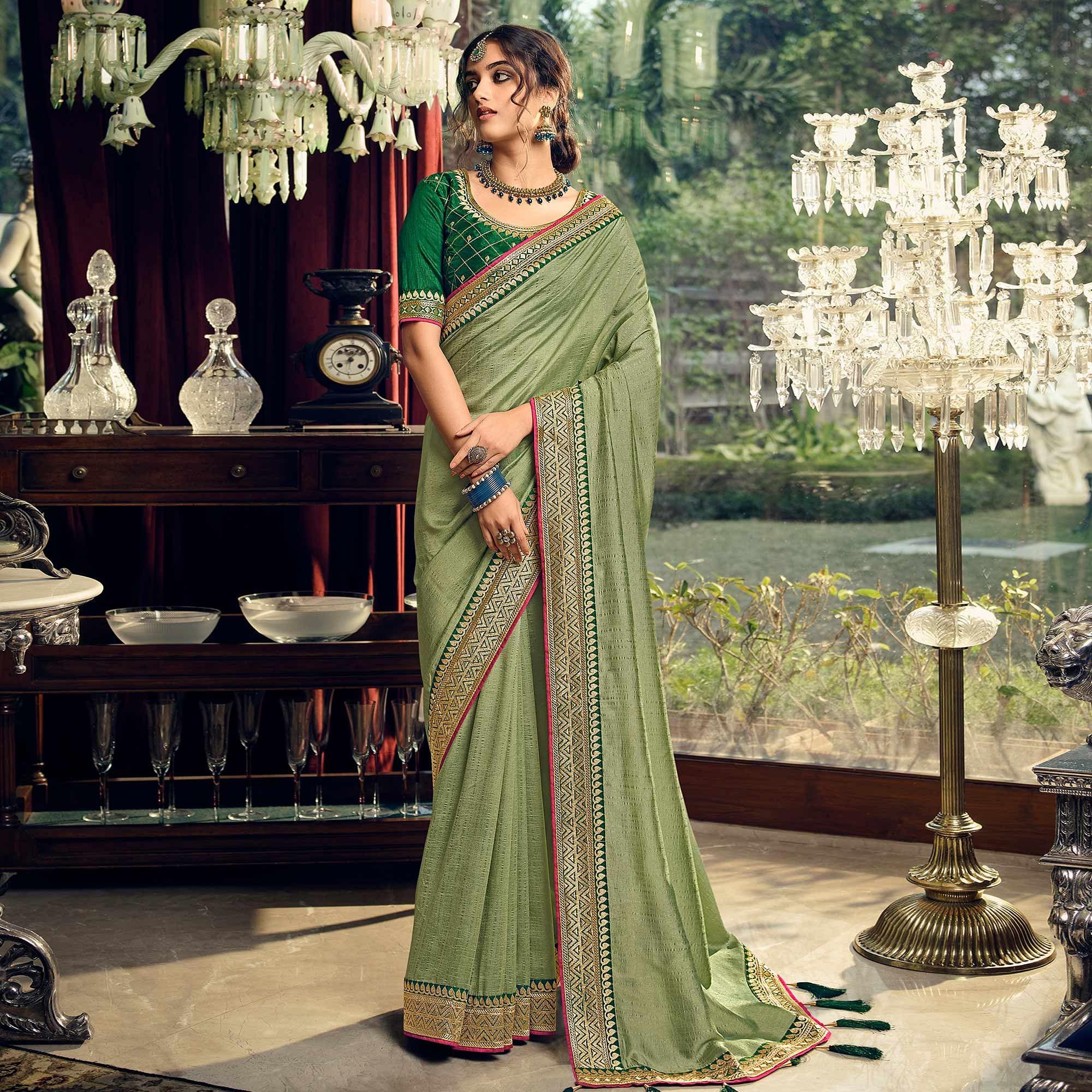 Green Partywear Embroidered Silk Saree - Peachmode