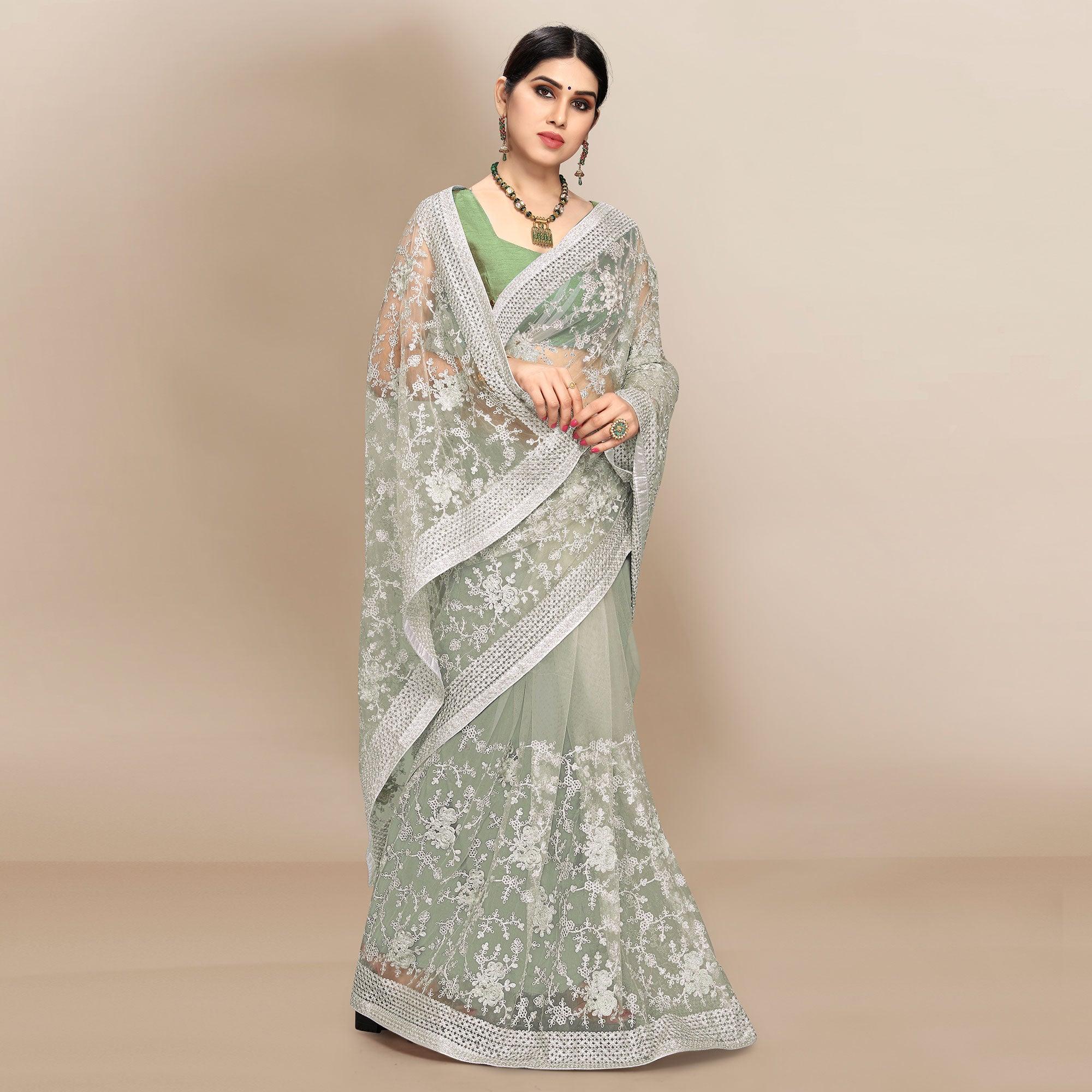 Green Partywear Floral Embroidered Soft Net Saree - Peachmode
