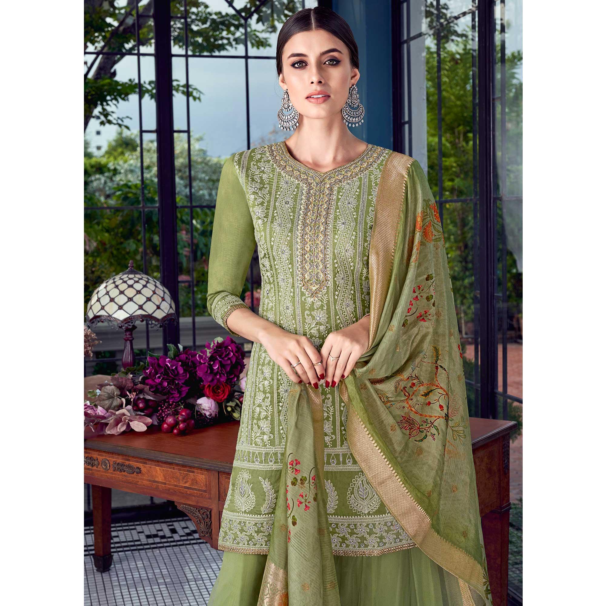 Green Partywear Lakhnavi Embroidered Silk Dress Material - Peachmode