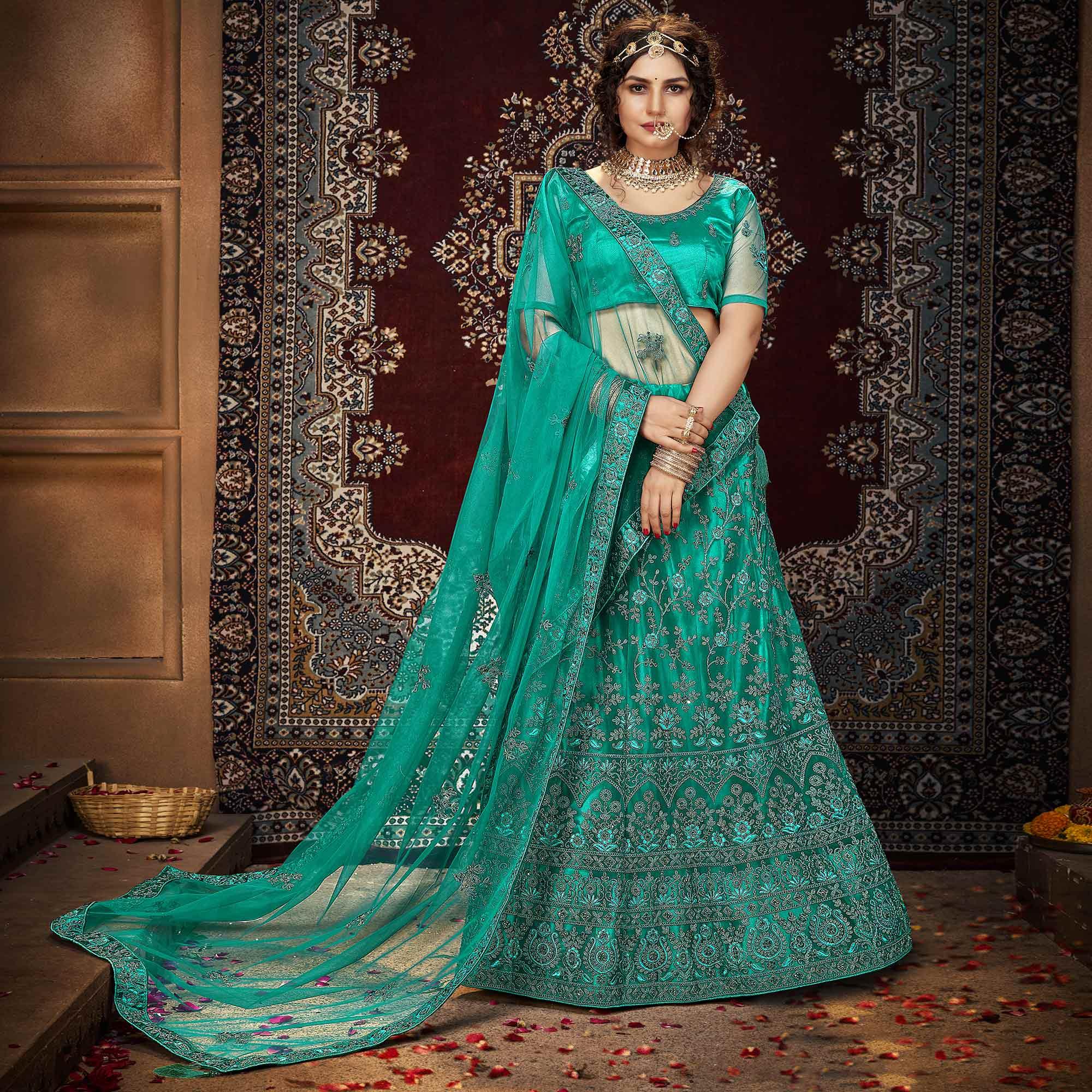 Green Partywear Multi Sequence Embroidered Net Lehenga Choli - Peachmode