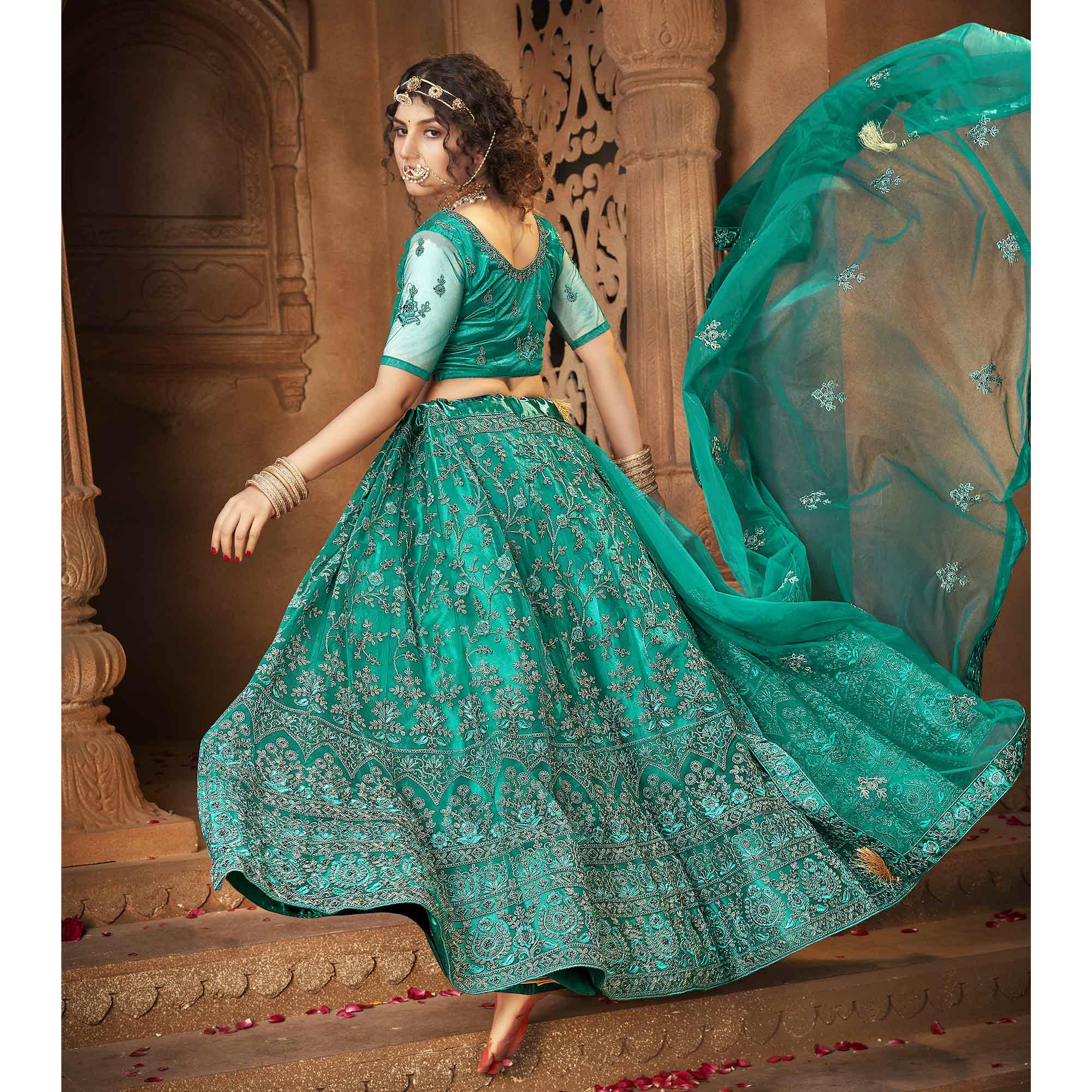 Green Partywear Multi Sequence Embroidered Net Lehenga Choli - Peachmode