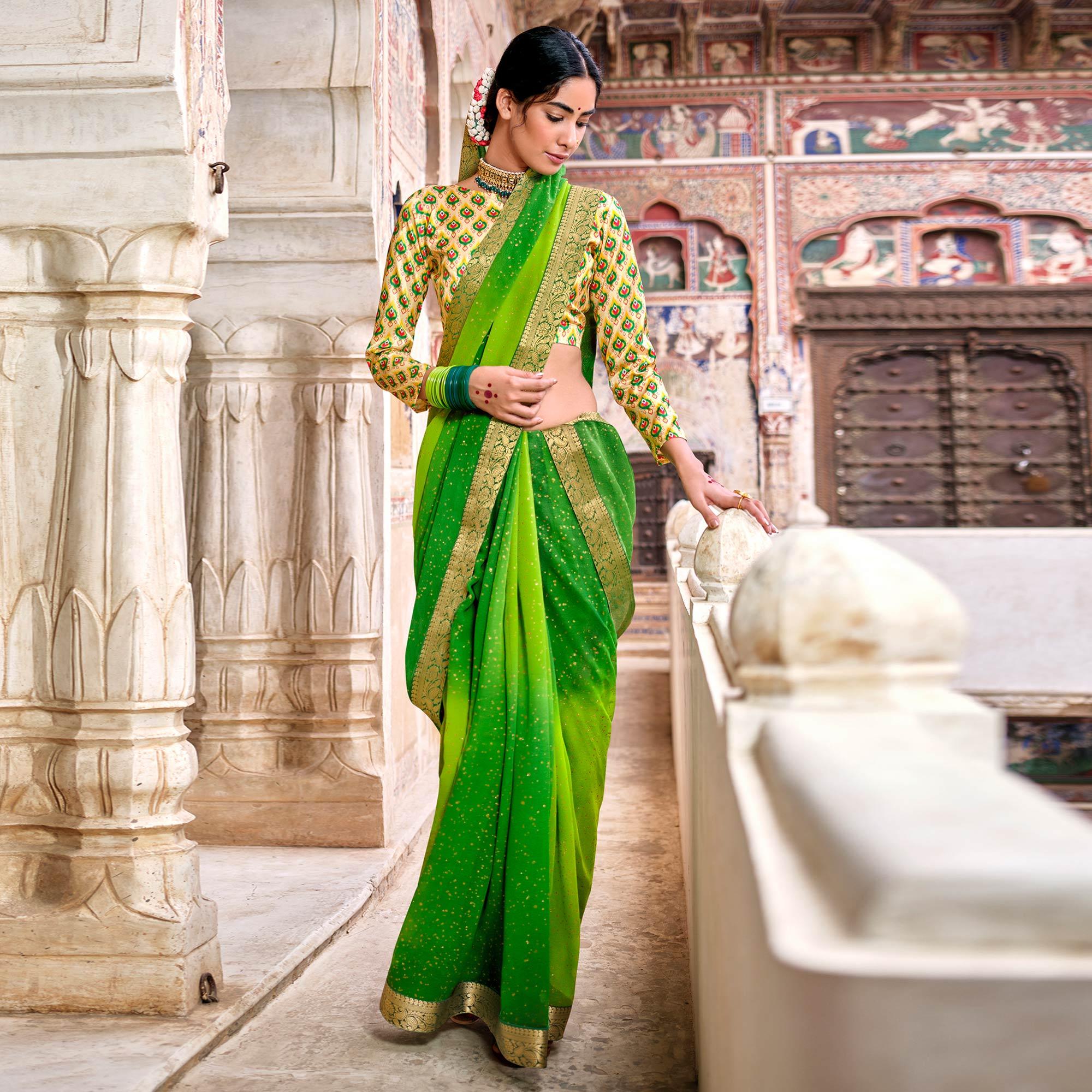 Green Partywear Printed Georgette Saree With Gold Zari - Peachmode