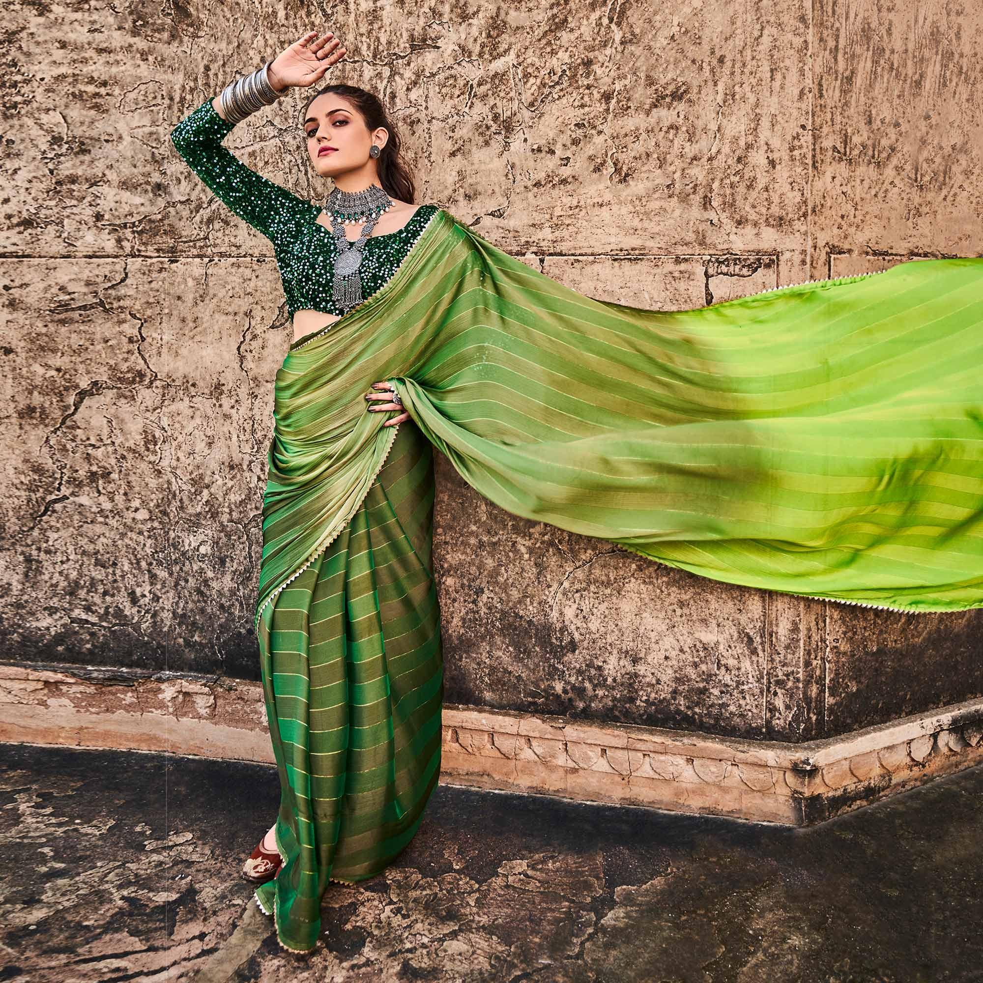 green partywear striped printed saree with fancy lace peachmode 1