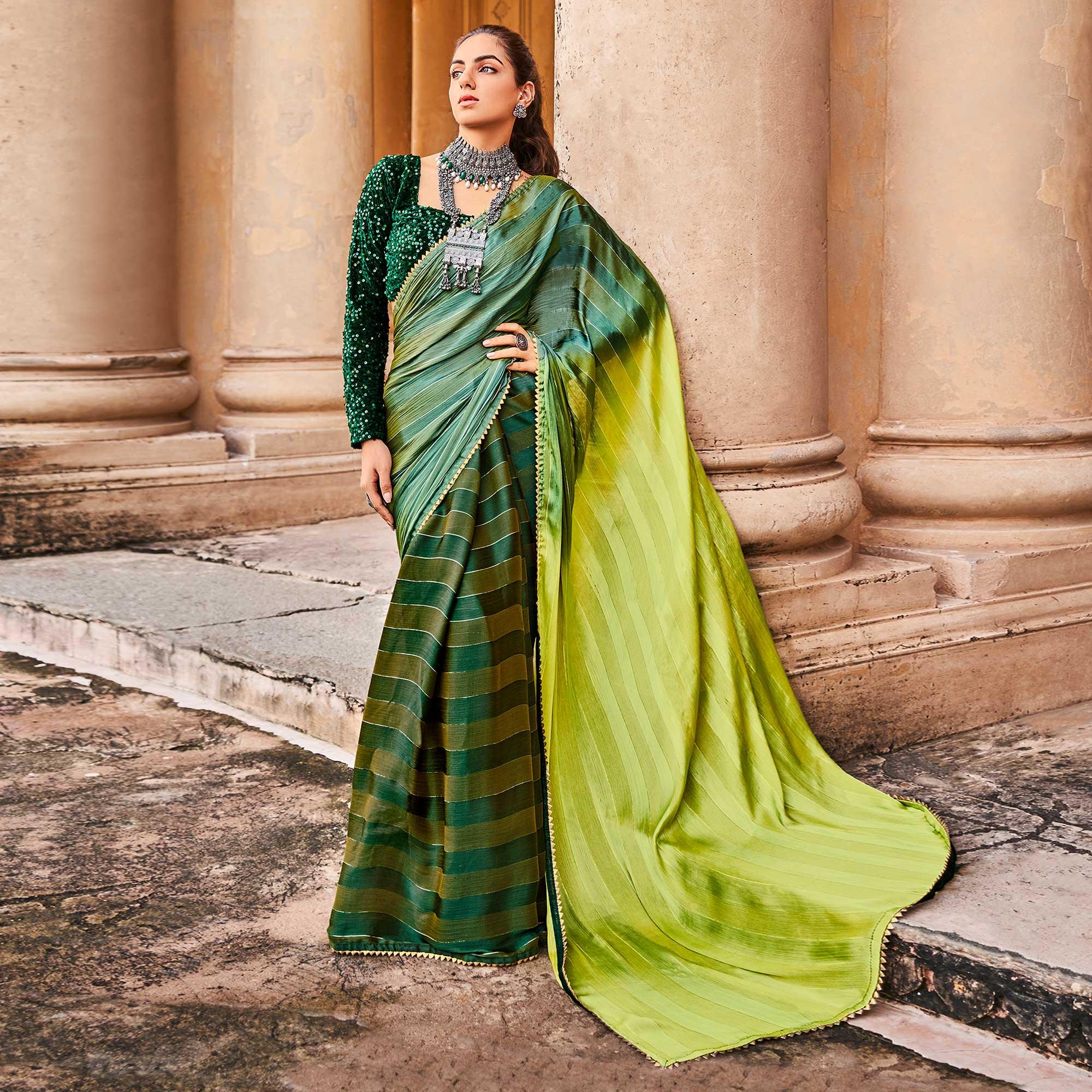 Green Partywear Striped Printed Saree With Fancy Lace - Peachmode