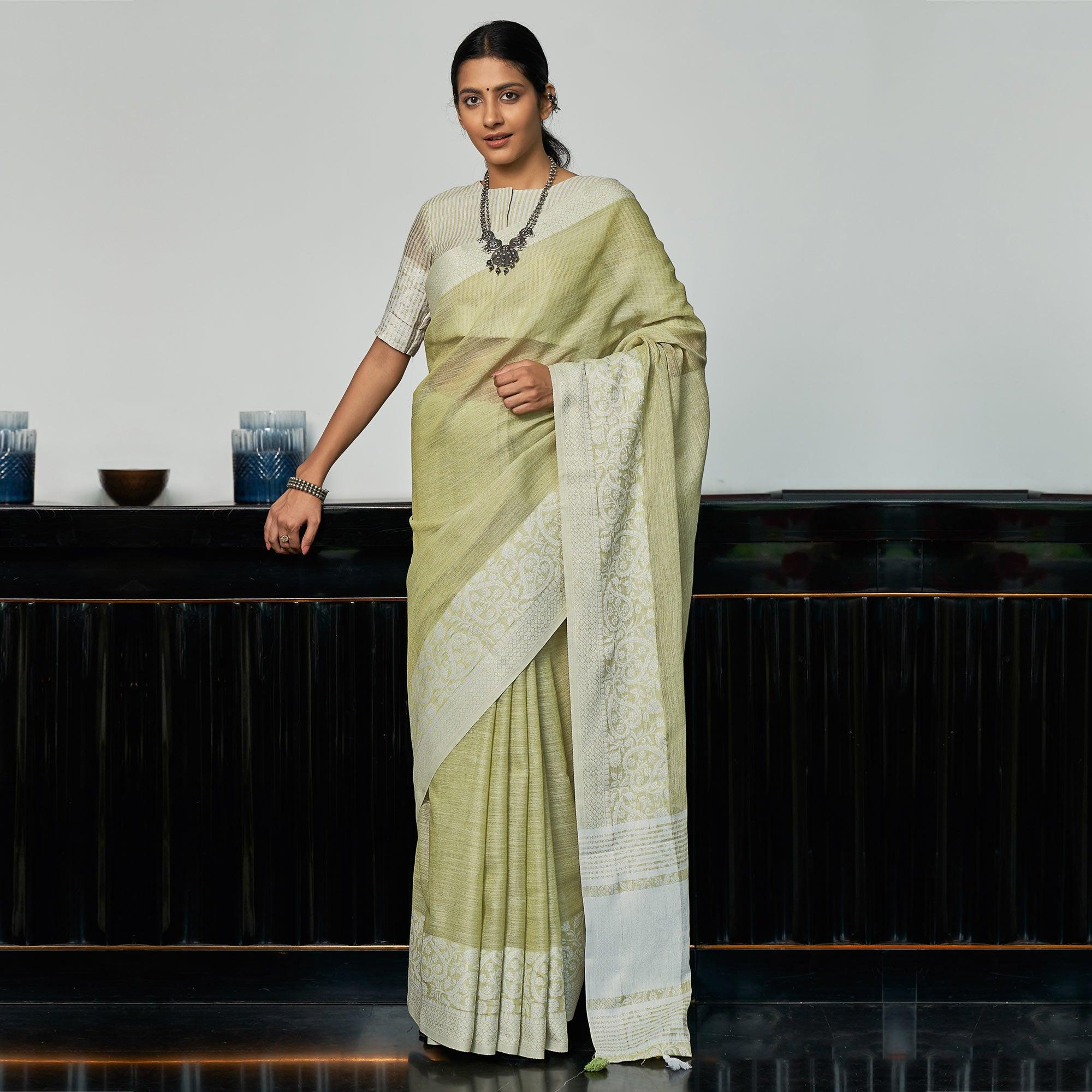 Green Partywear Woven Linen Saree - Peachmode