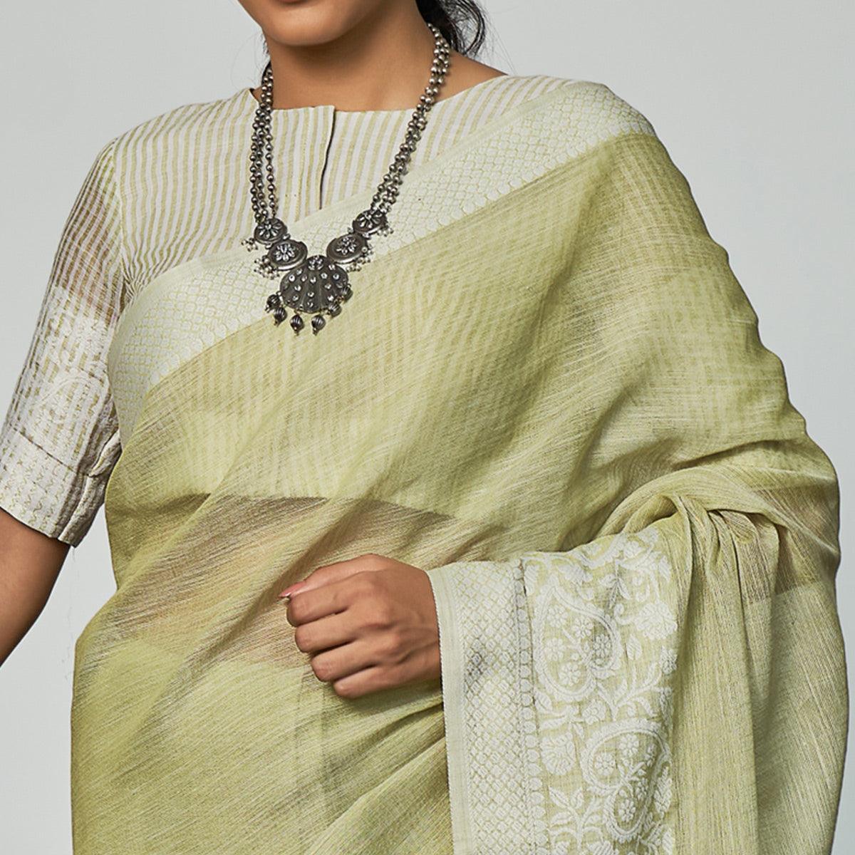 Green Partywear Woven Linen Saree - Peachmode