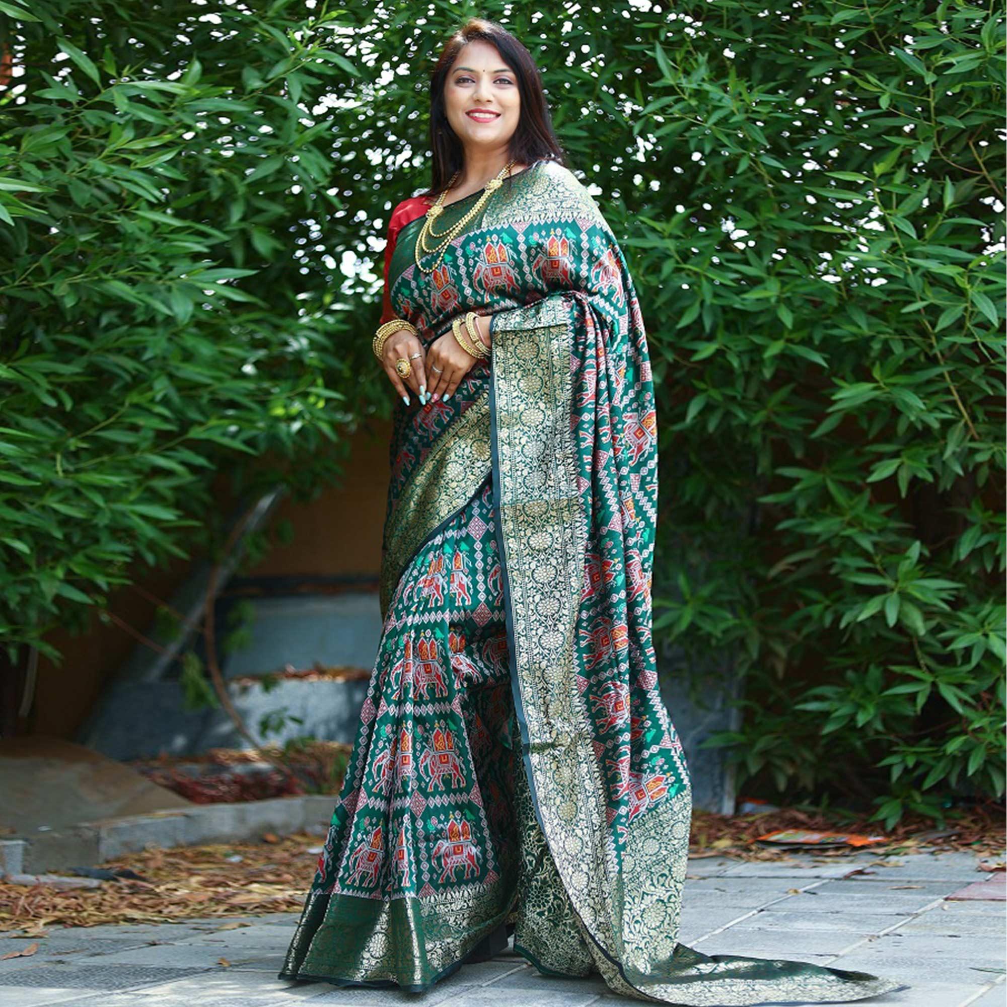 Green Patola Printed Silk Saree - Peachmode