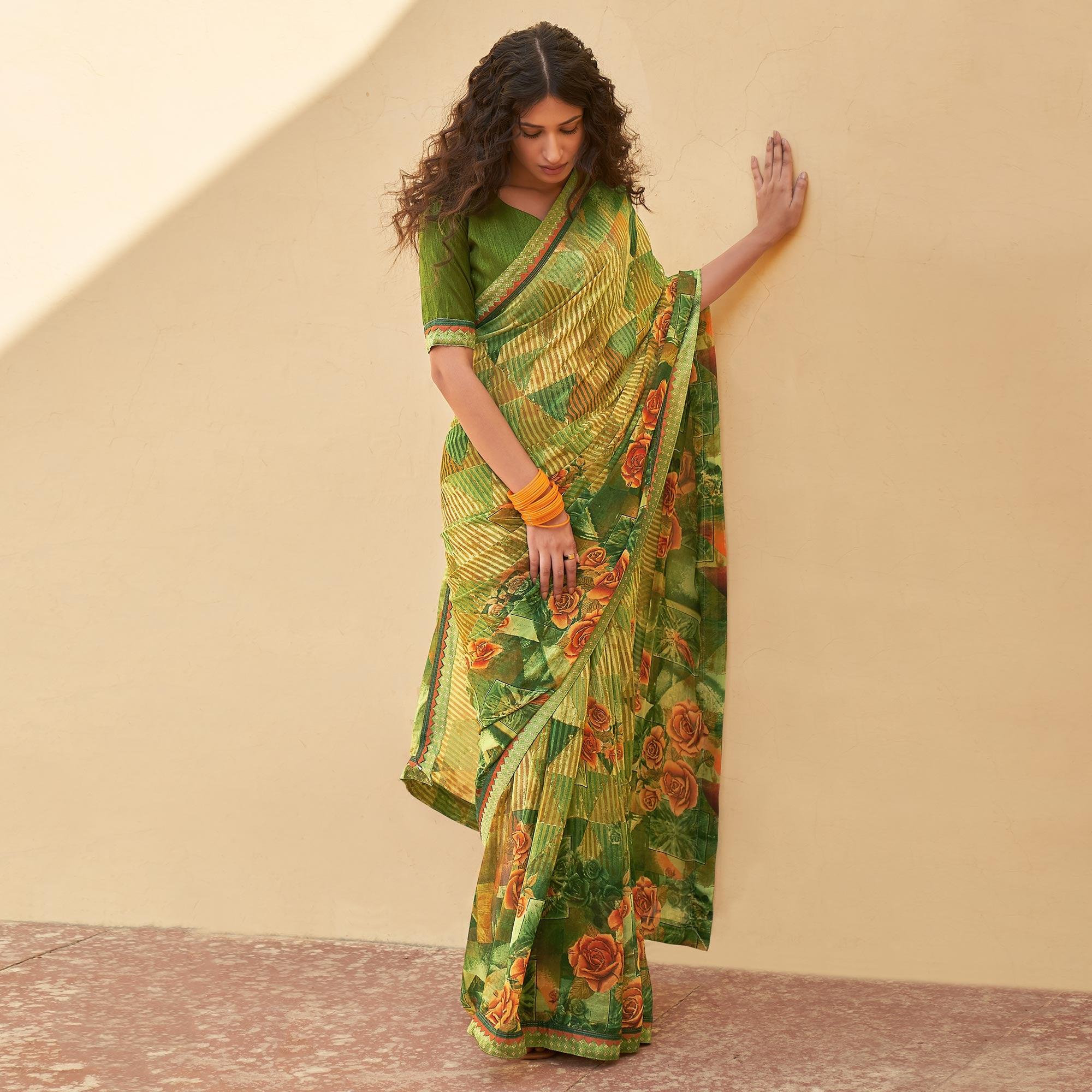 Green Printed Georgette Saree - Peachmode