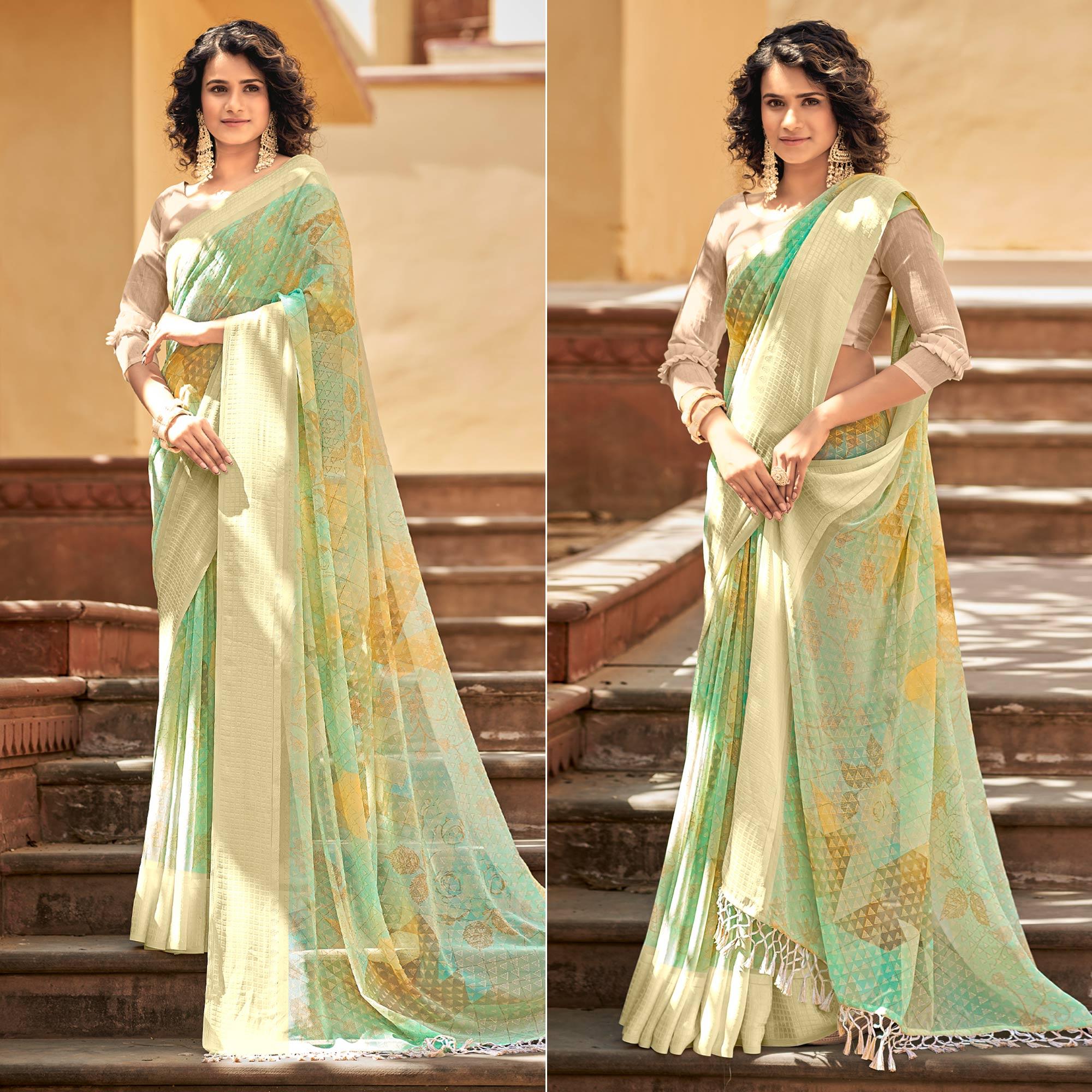 Green Printed Georgette Saree With Tassels - Peachmode