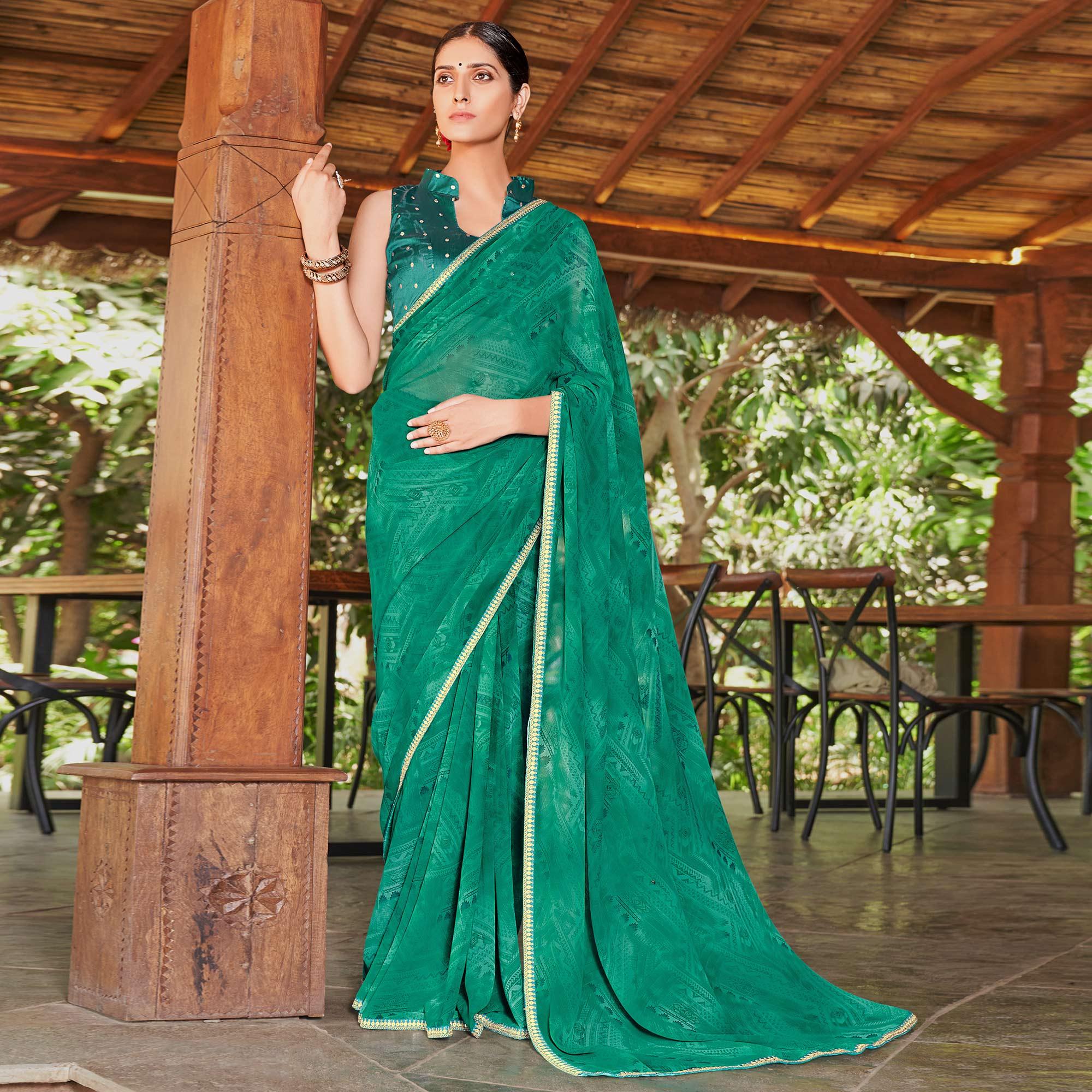 Green Printed With Sequence Embroidered Border Georgette Saree - Peachmode