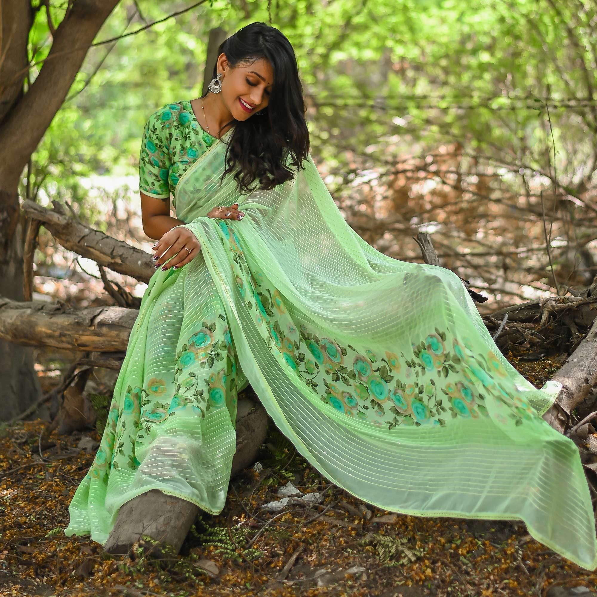 Green Sequence Embroidered Art Silk Saree - Peachmode