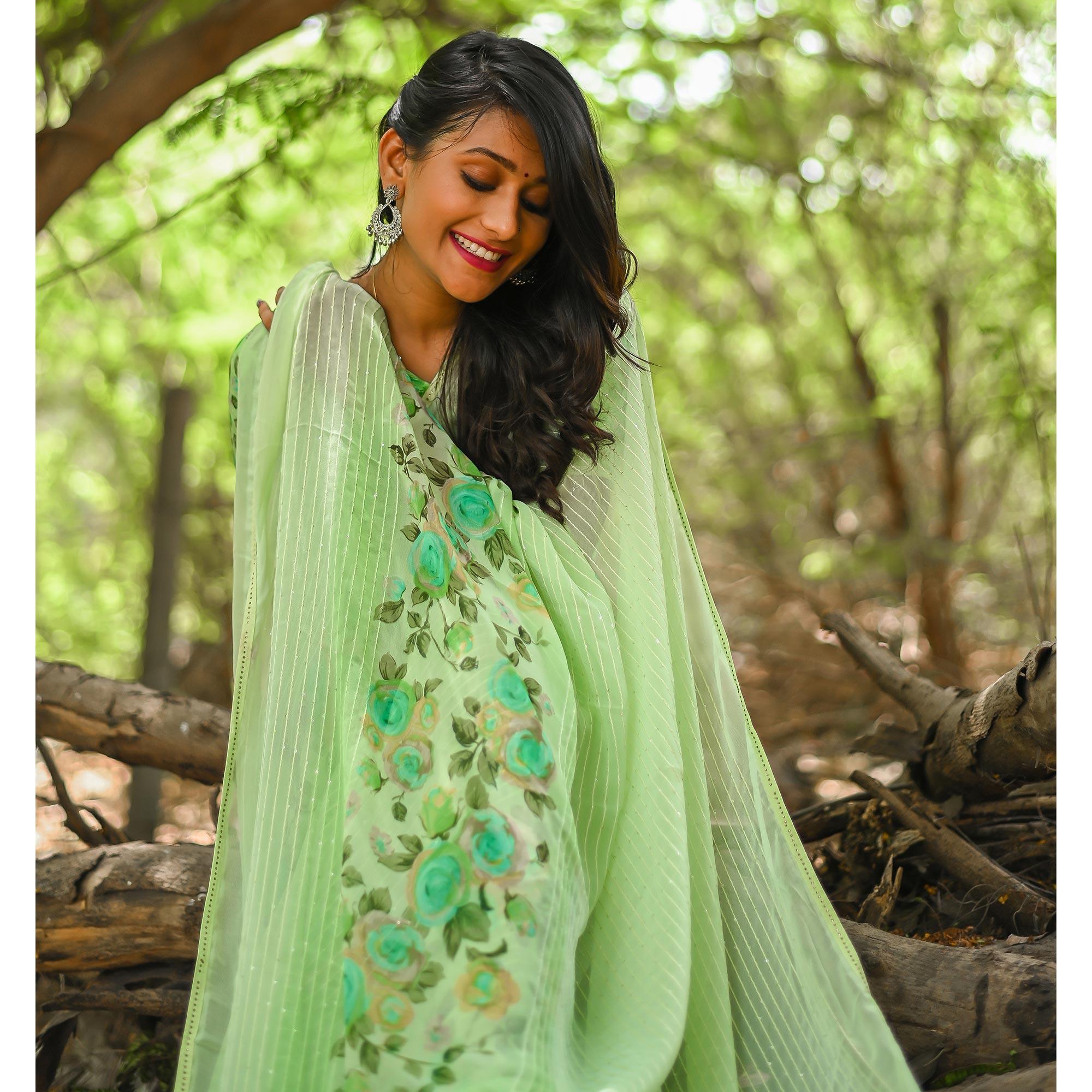 Green Sequence Embroidered Art Silk Saree - Peachmode