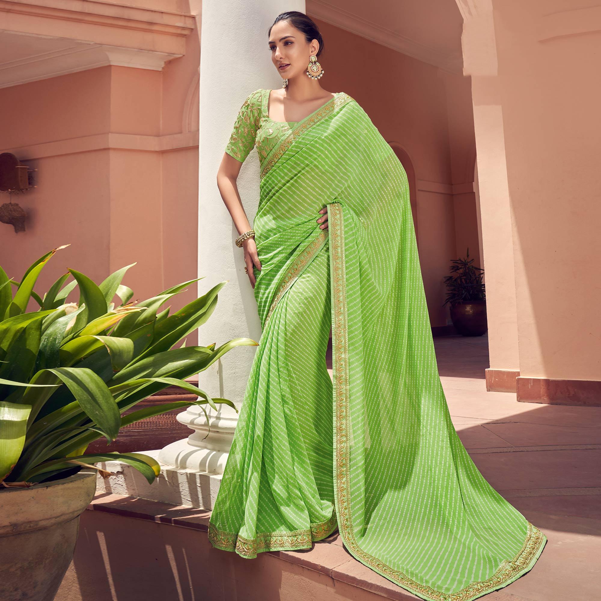 Green Striped Printed Georgette Saree - Peachmode