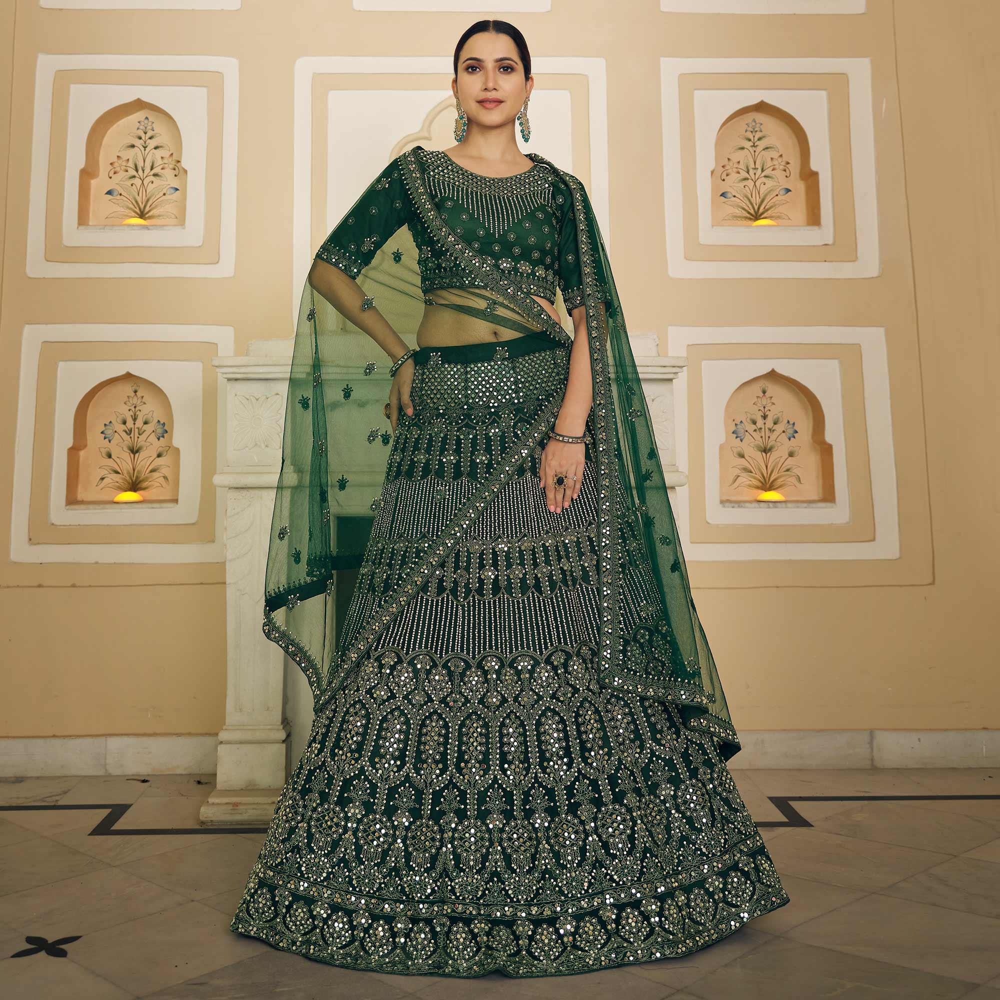 Green Wedding Wear Embellished Netted Lehenga Choli - Peachmode