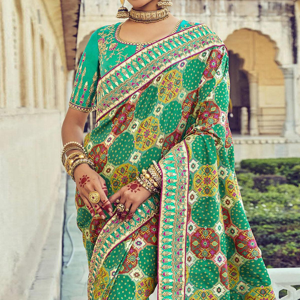 Green Wedding Wear Resham With Embellished Silk Bhandhani Patola Saree - Peachmode