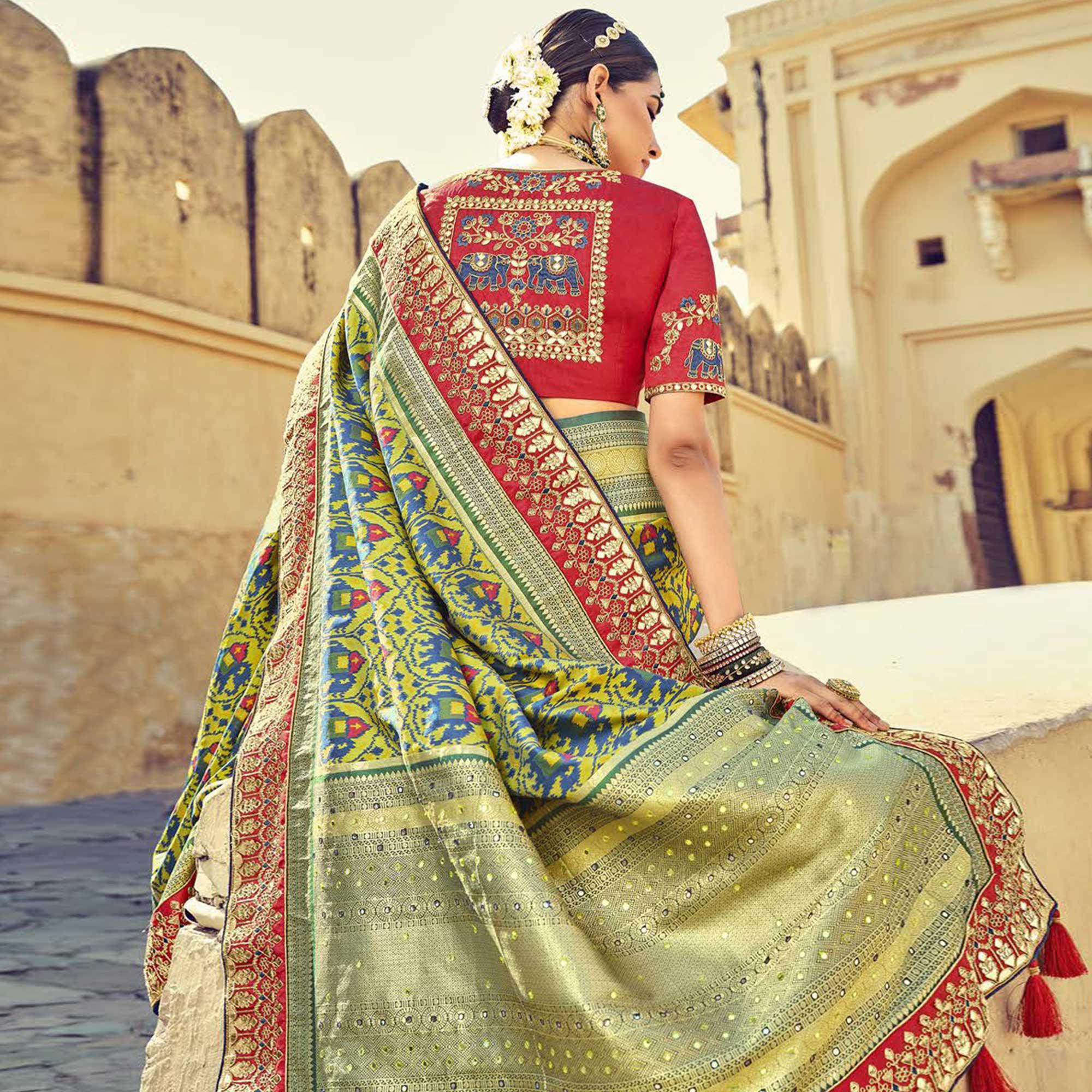 Green Wedding Wear Resham With Embellished Silk Patola Saree - Peachmode