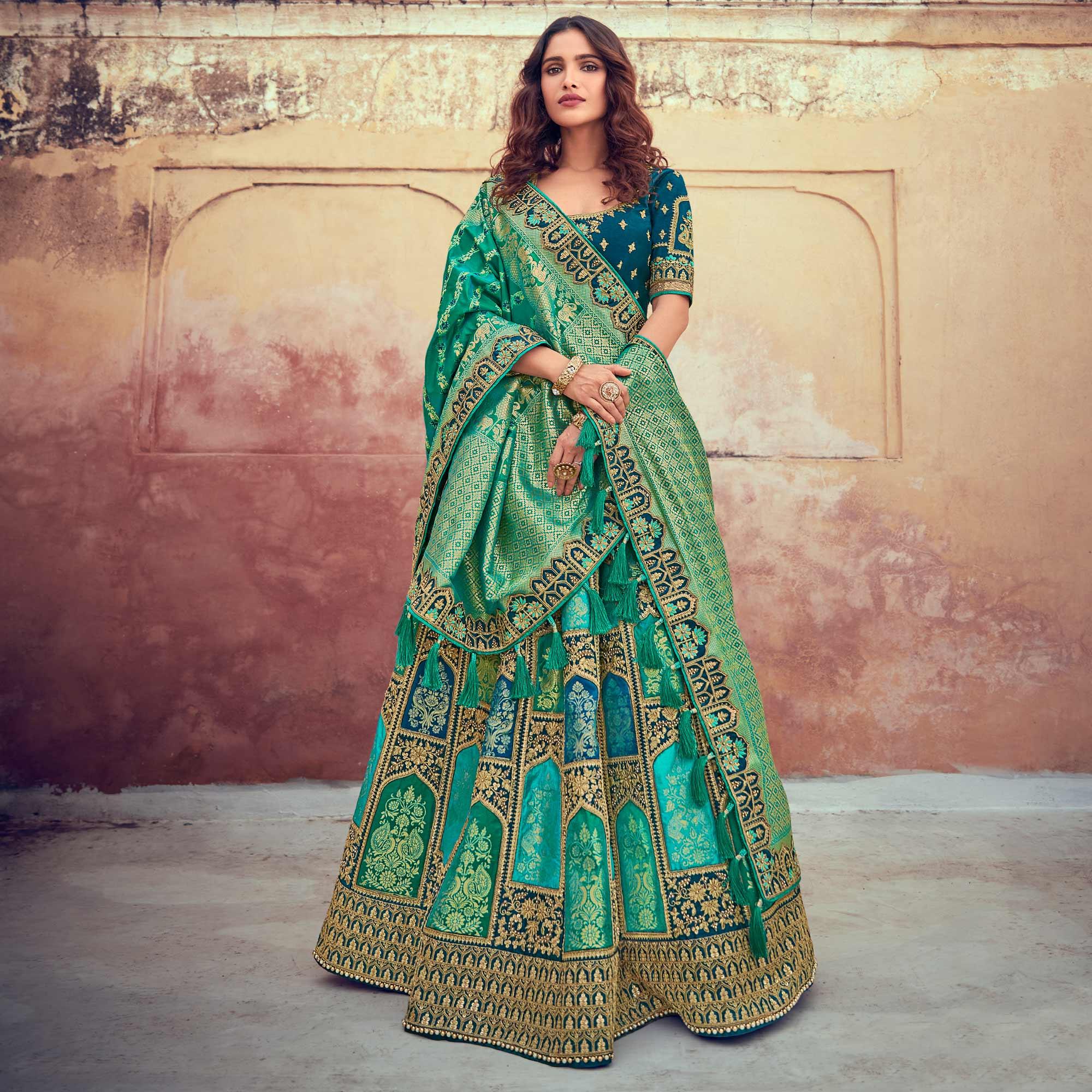 Green Wedding Wear Woven & Embroidered Silk Lehenga Choli - Peachmode