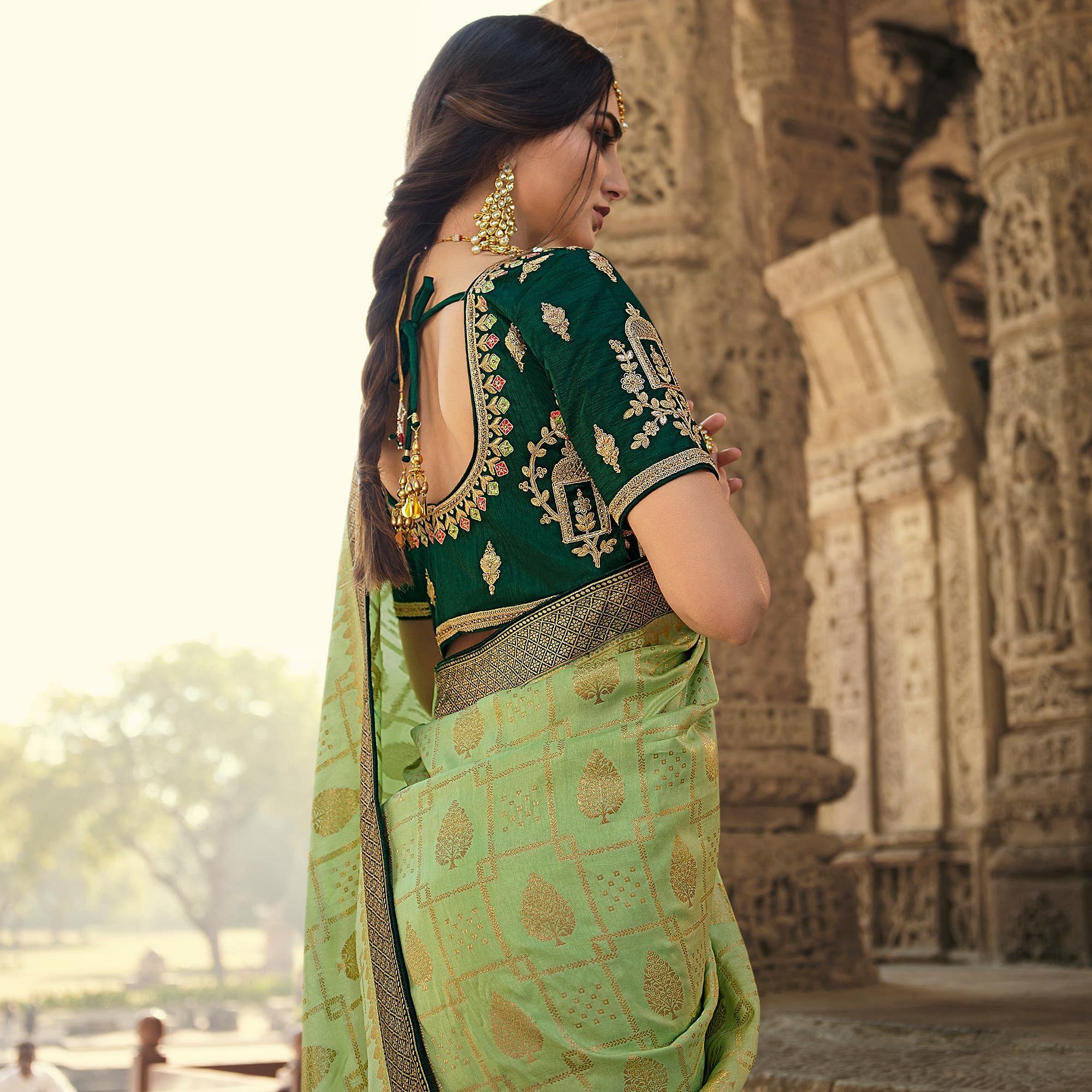 Green Wedding Wear Woven Silk Saree With Tassels - Peachmode