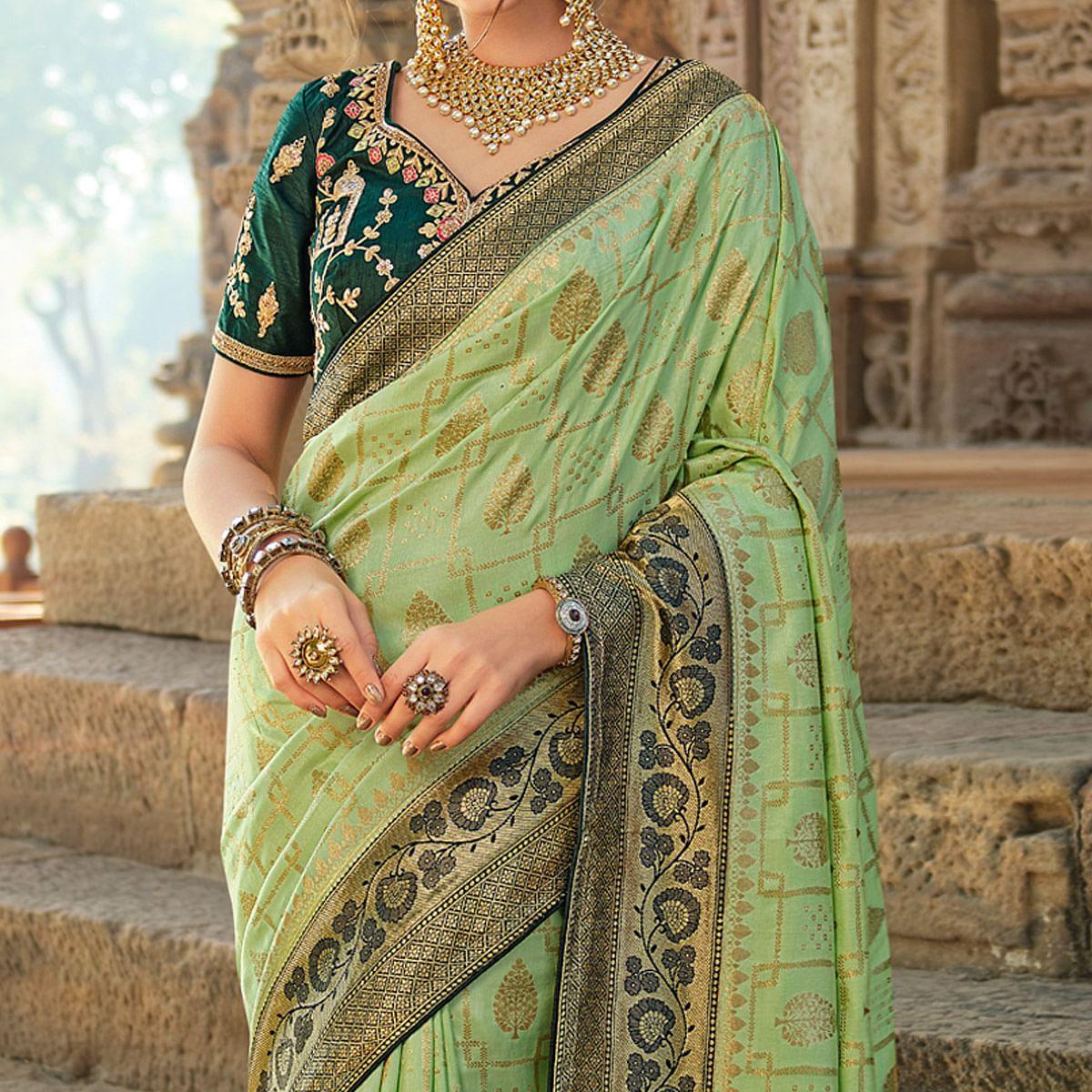 Green Wedding Wear Woven Silk Saree With Tassels - Peachmode