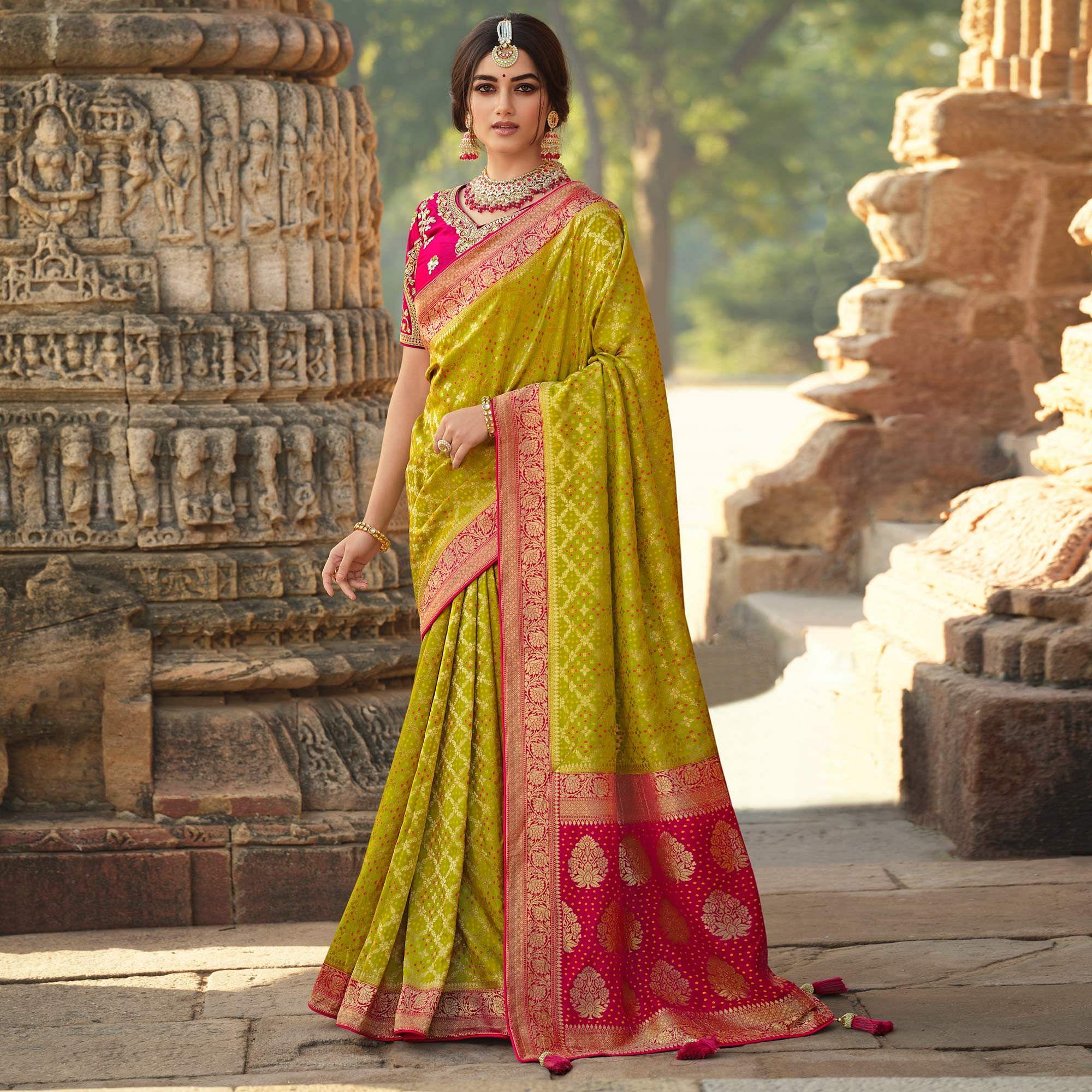 Green Wedding Wear Woven Silk Saree With Tassels - Peachmode
