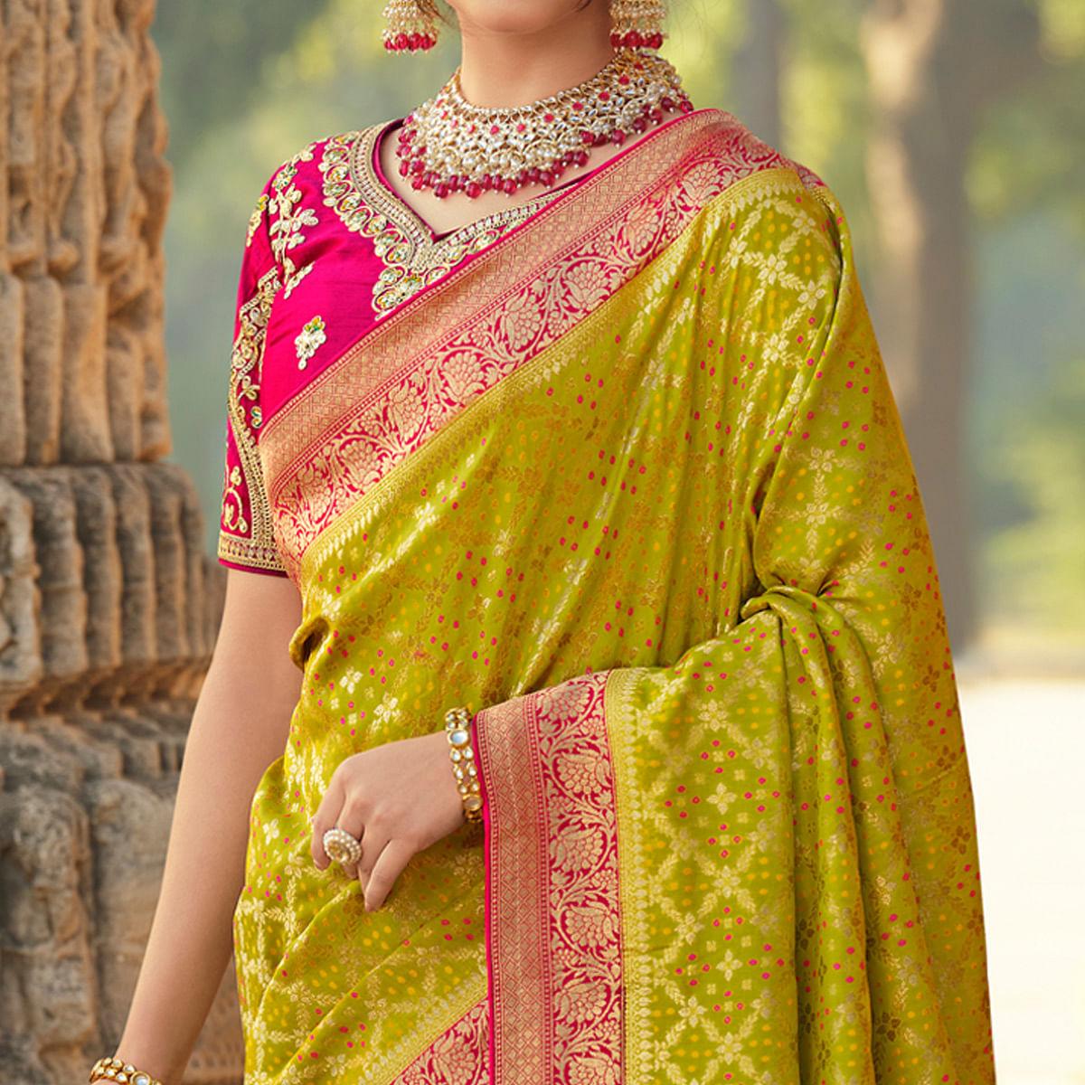 Green Wedding Wear Woven Silk Saree With Tassels - Peachmode