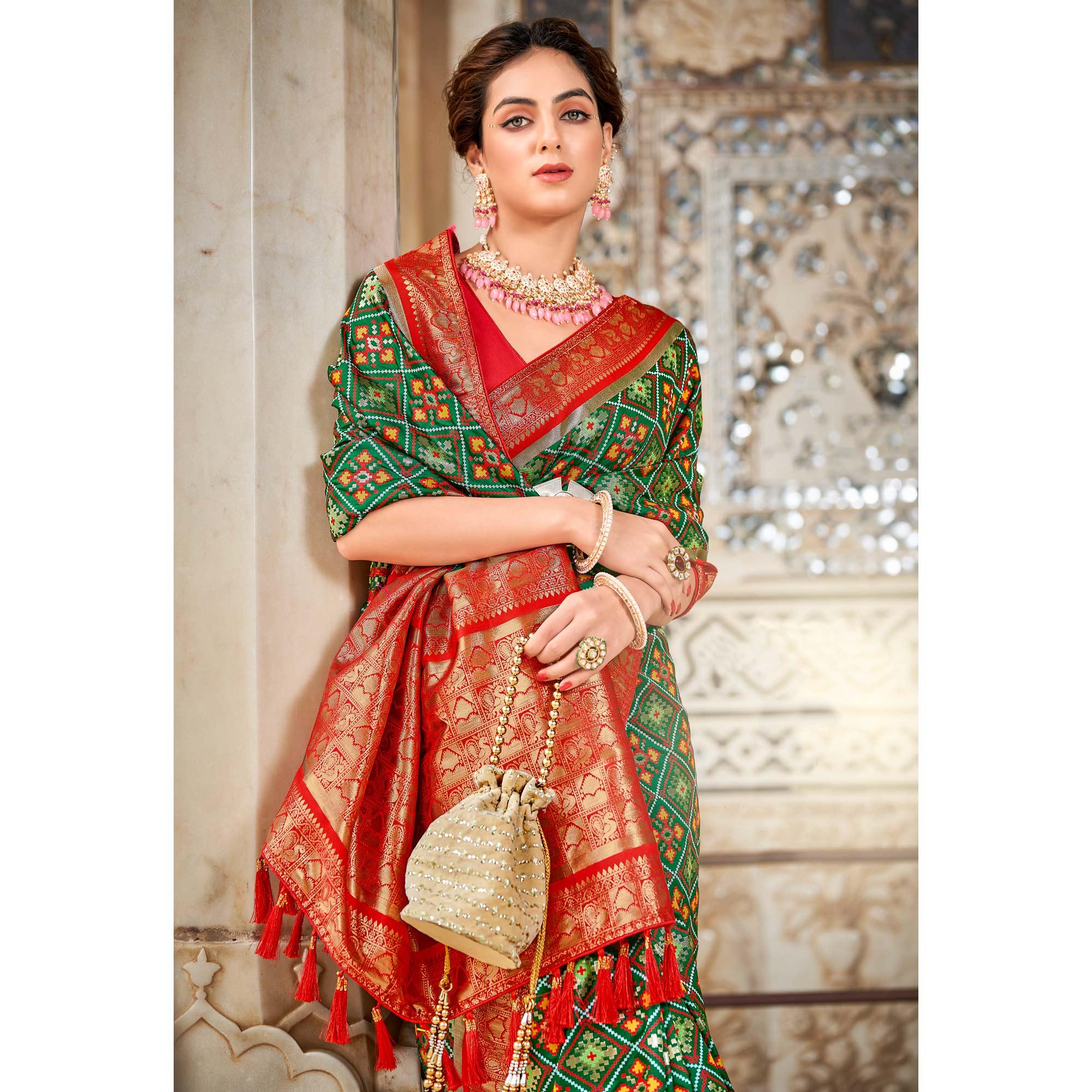 Green Woven Art Silk Patola Saree With Tassels - Peachmode