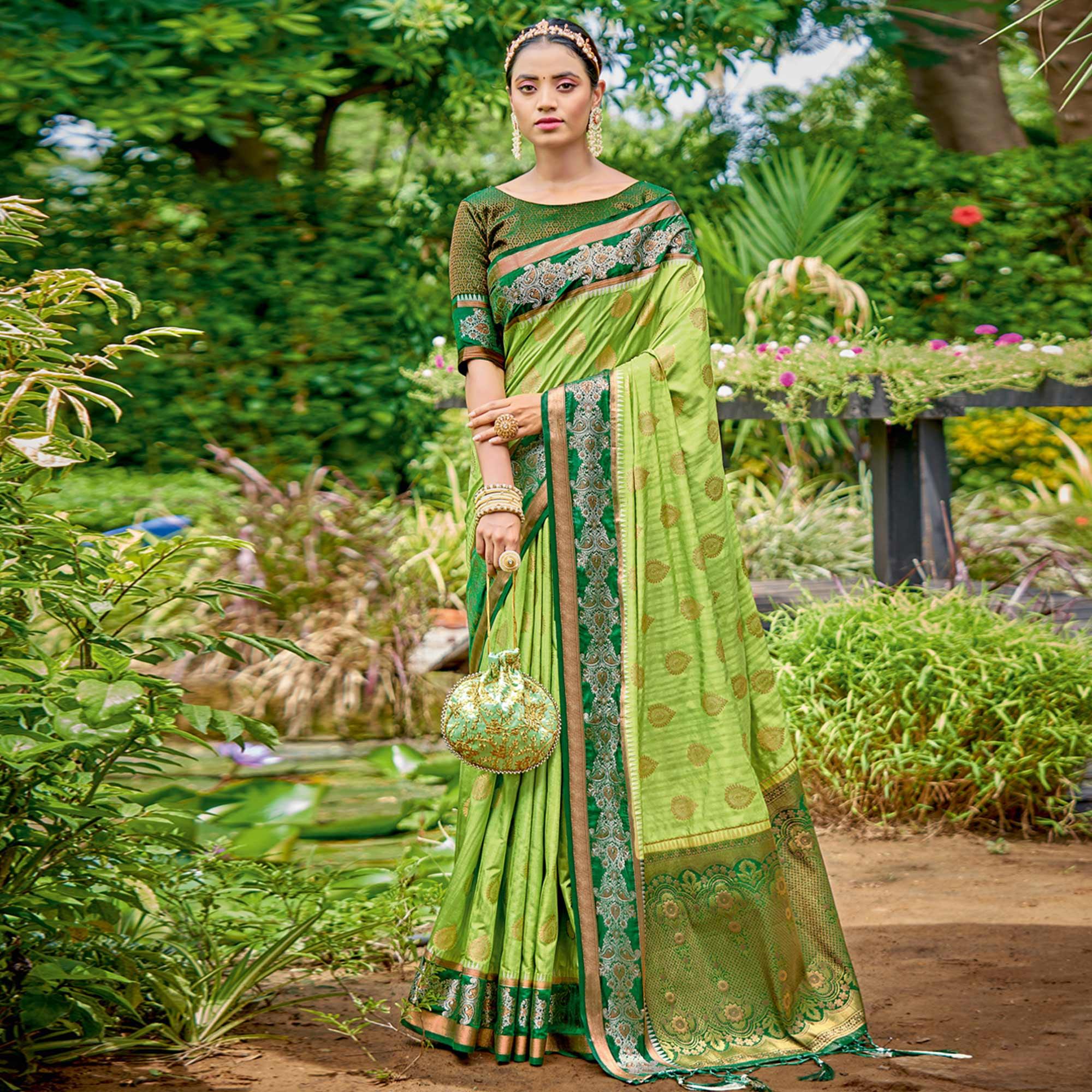 Green Woven Banarasi Silk Saree With Tassels - Peachmode