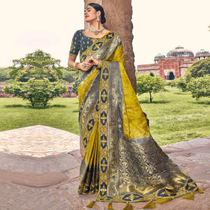 Green Woven Banarasi Silk Saree With Tassels - Peachmode