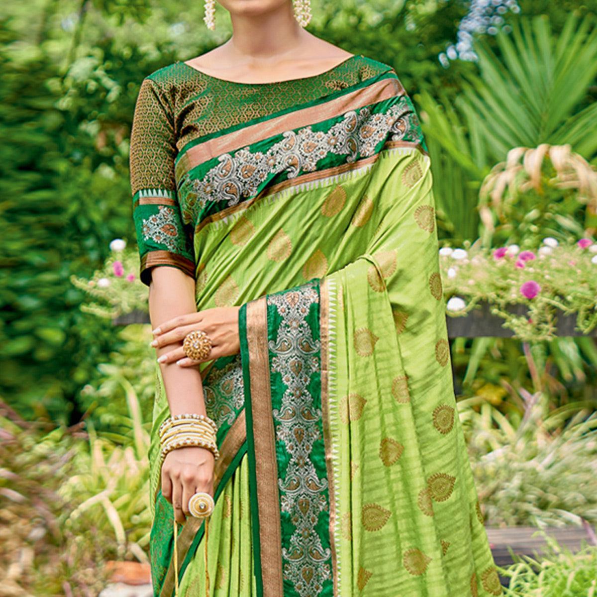 Green Woven Banarasi Silk Saree With Tassels - Peachmode