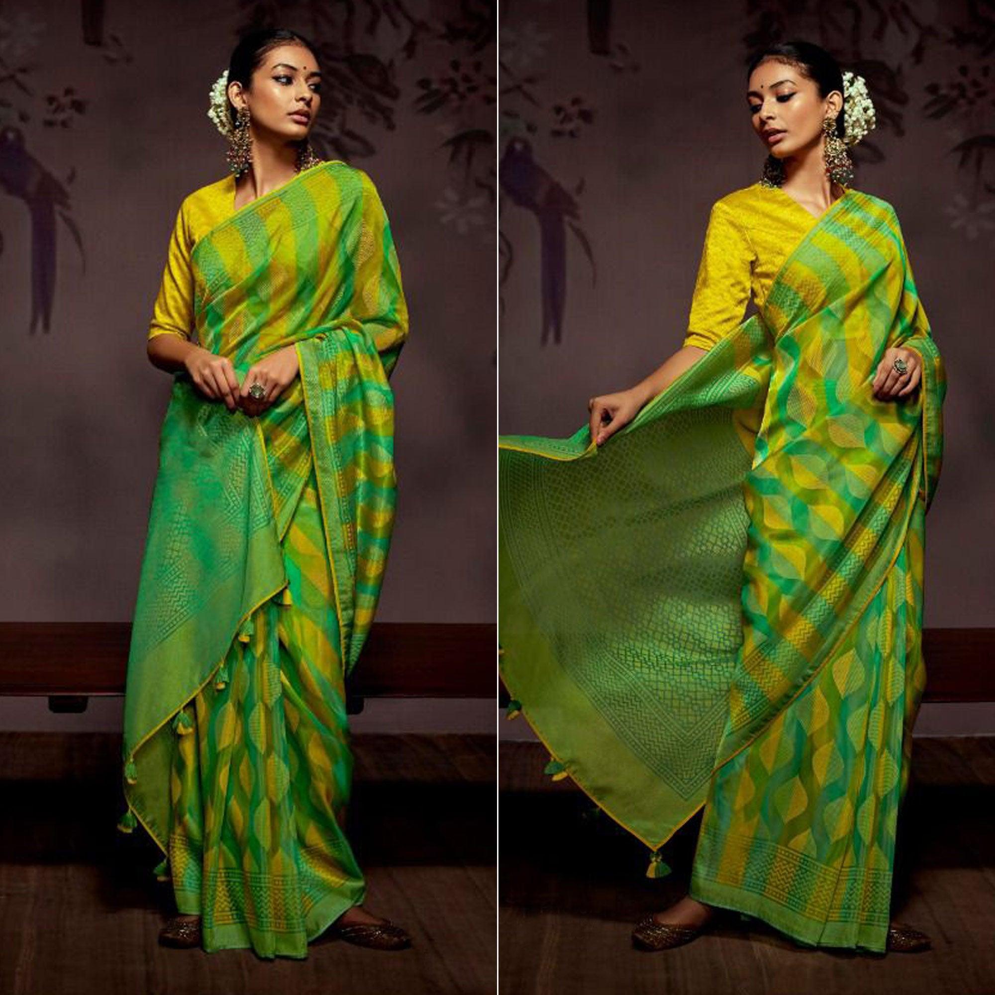 Green Woven Brasso Saree With Tassels - Peachmode