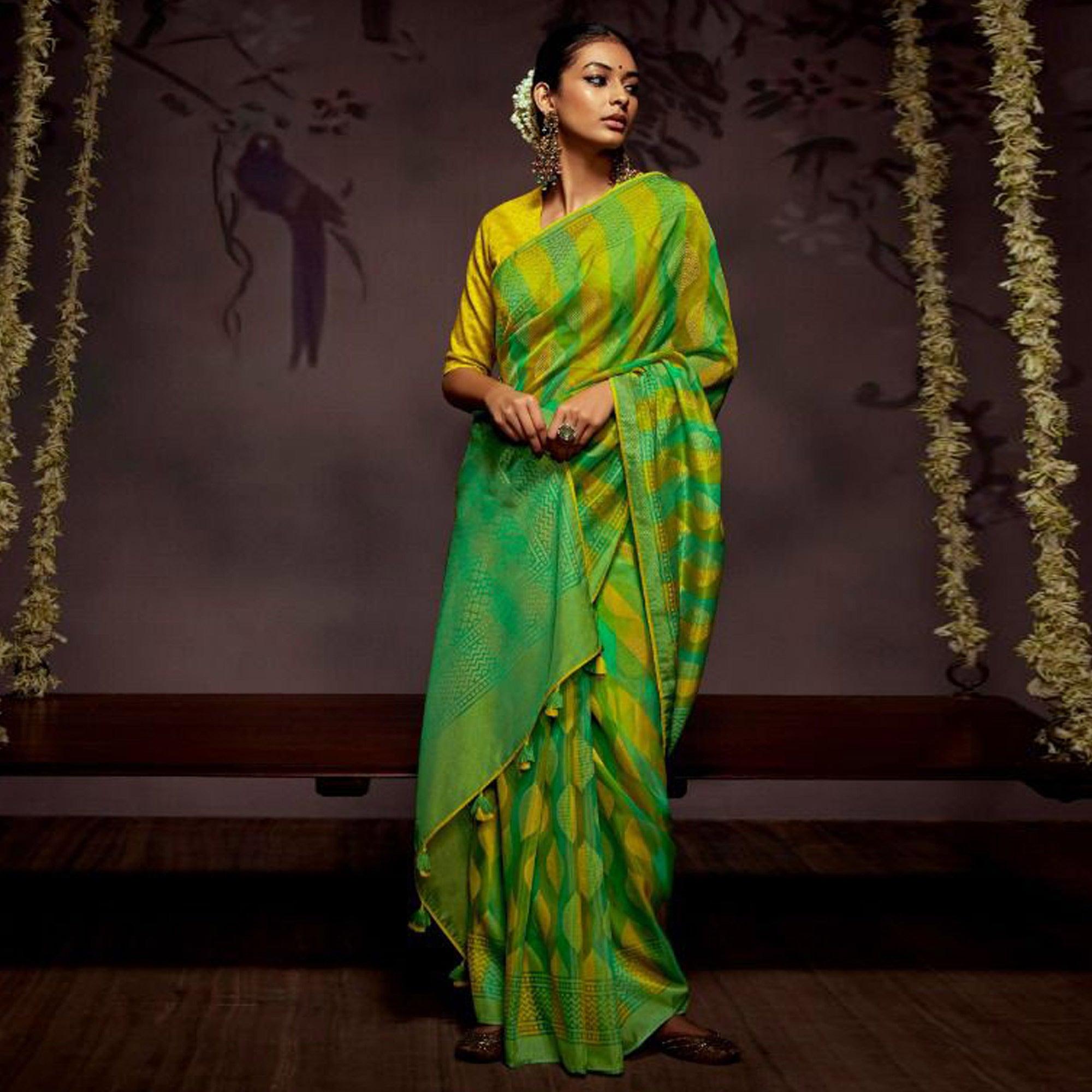 Green Woven Brasso Saree With Tassels - Peachmode