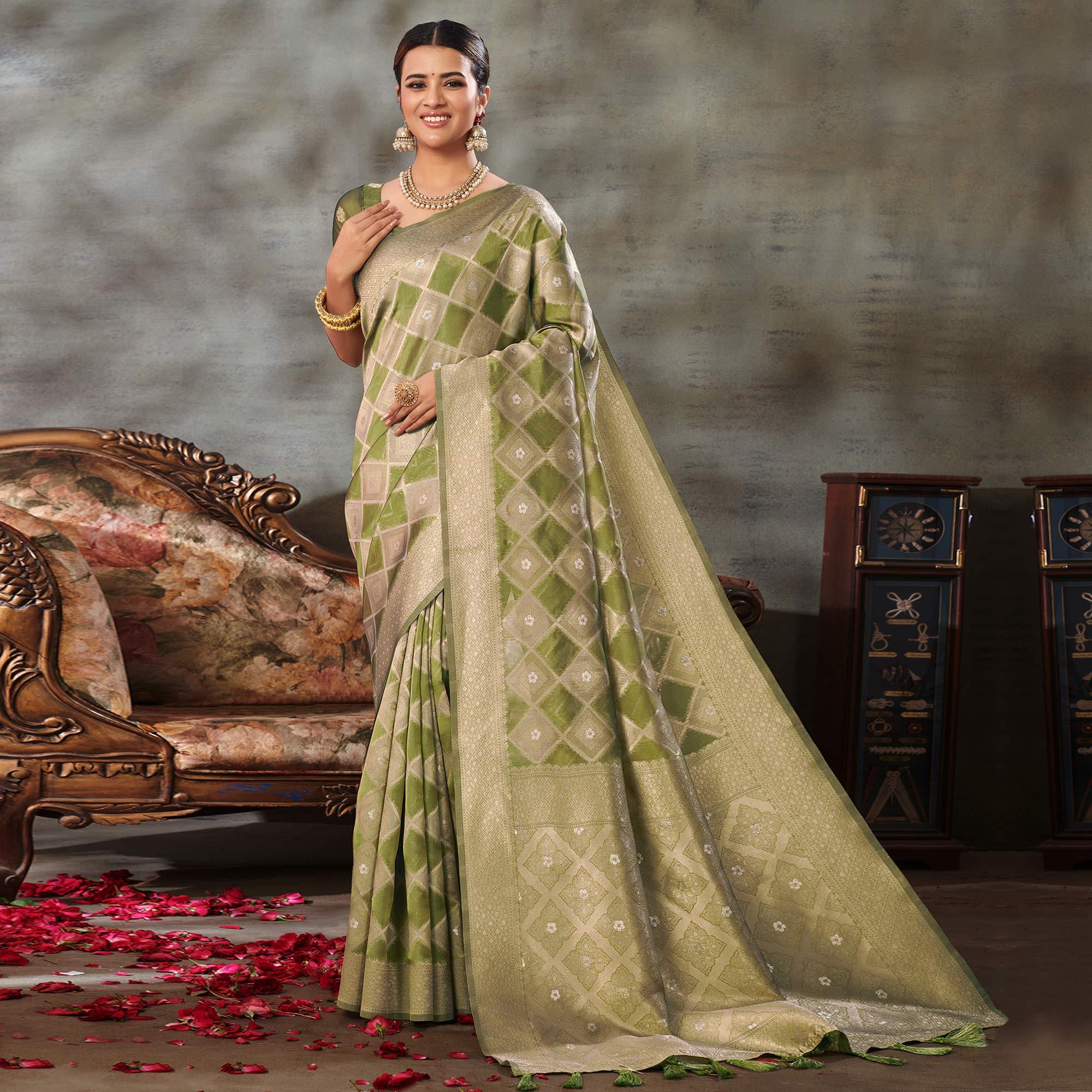Green Woven Organza Saree With Tassels - Peachmode