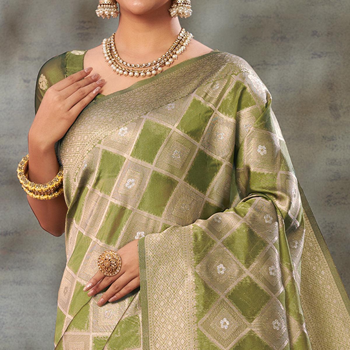 Green Woven Organza Saree With Tassels - Peachmode