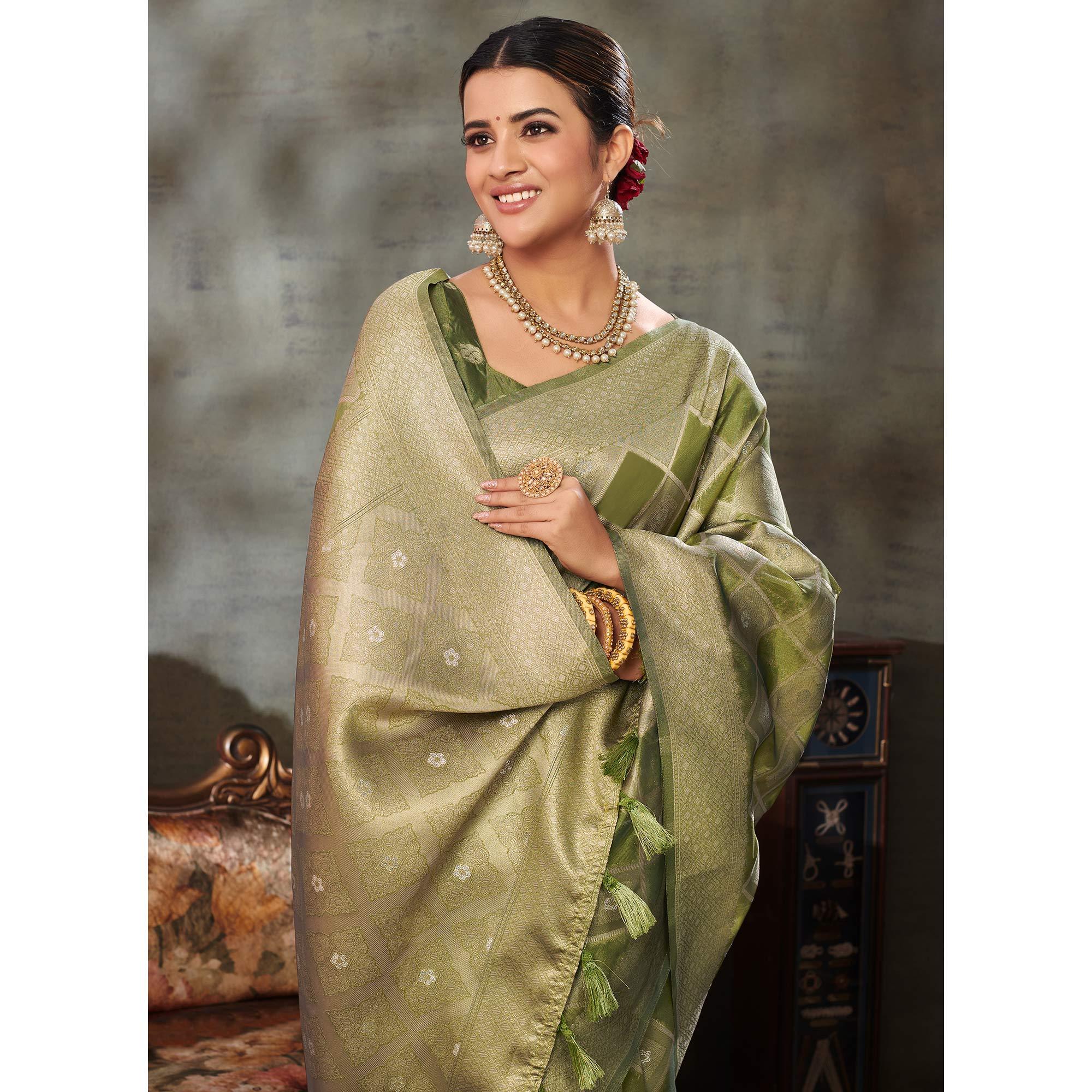 Green Woven Organza Saree With Tassels - Peachmode