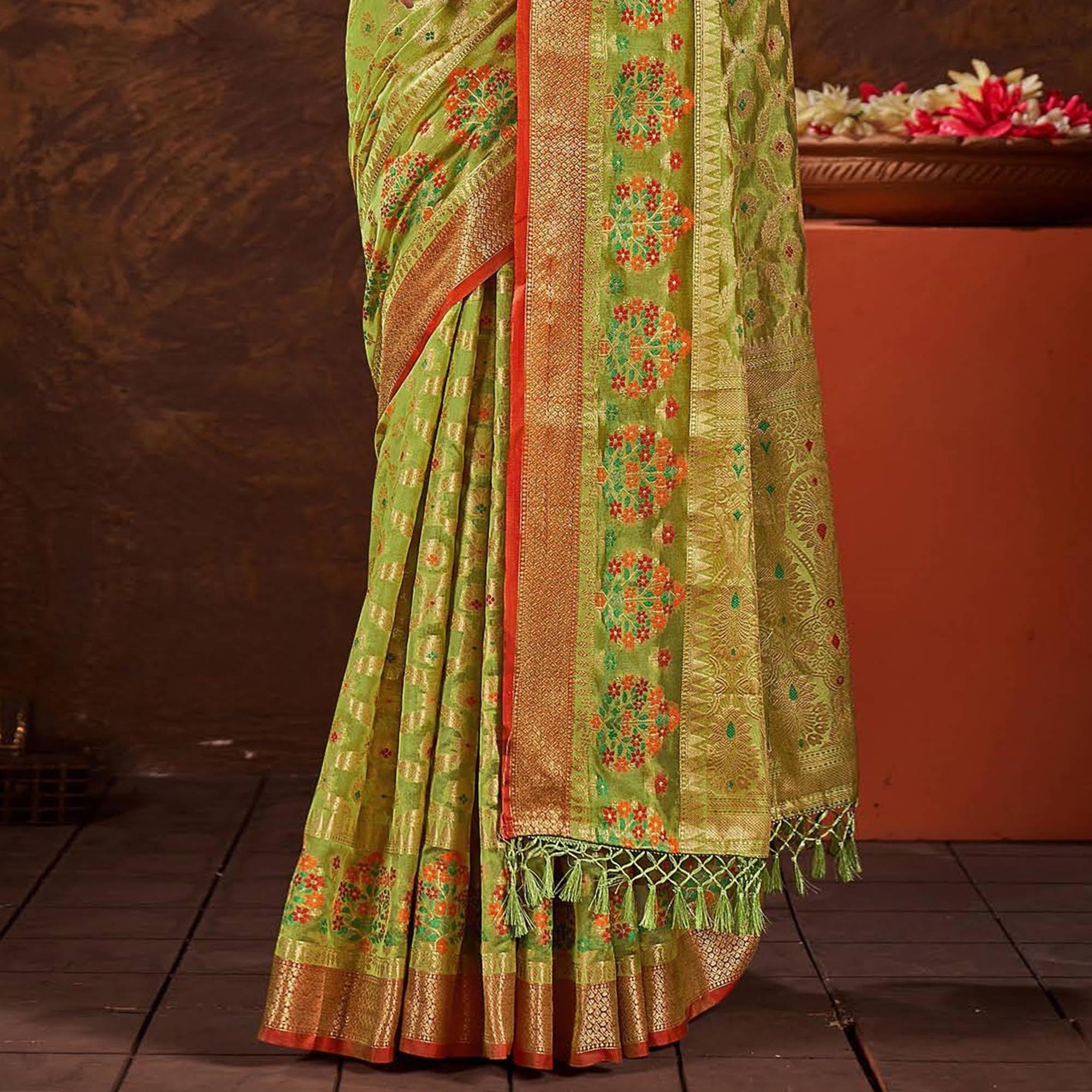 Green Woven Organza Saree With Tassels - Peachmode
