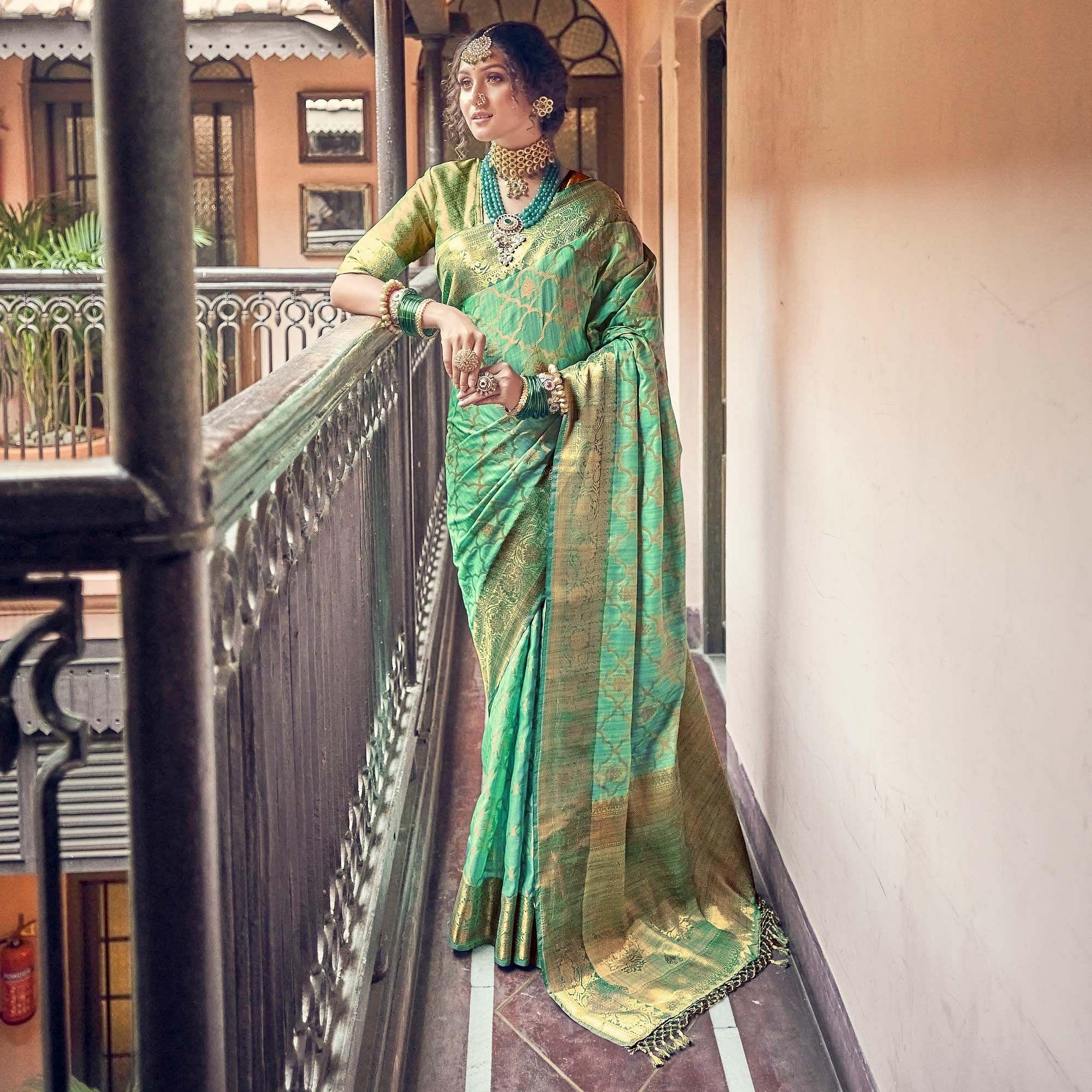 Green Woven Pure Silk Saree With Tassels - Peachmode