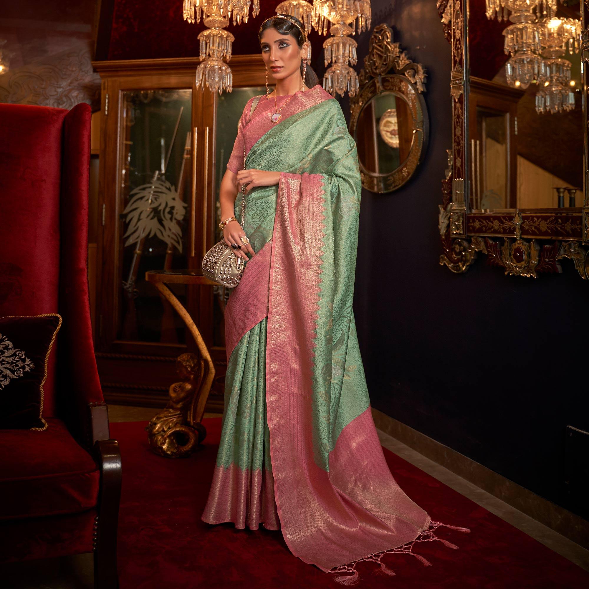 Green Woven Pure Silk Saree With Tassels - Peachmode