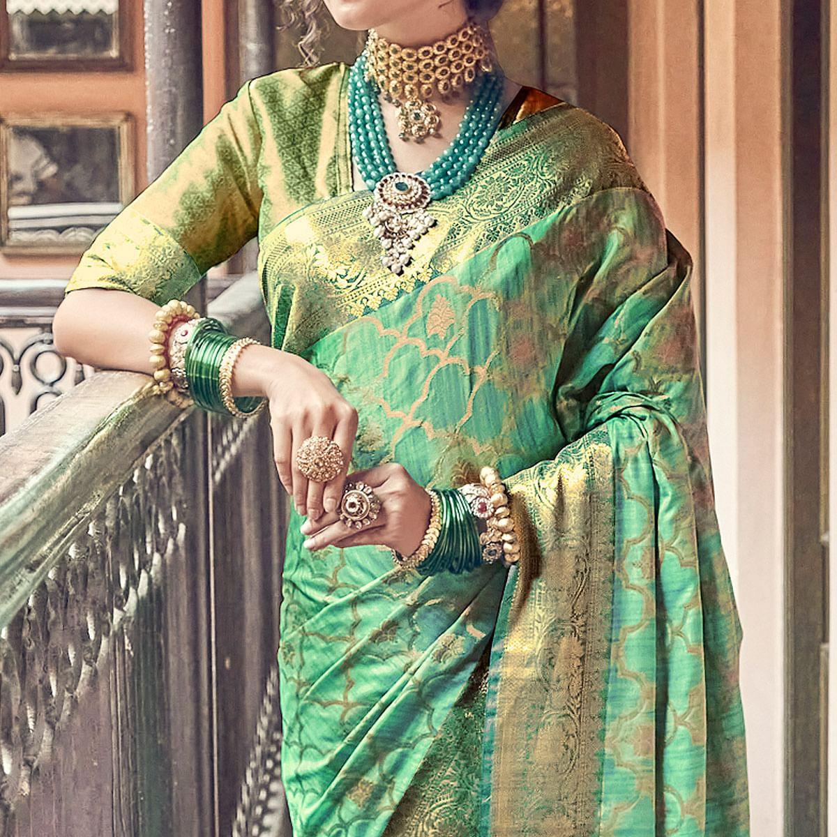 Green Woven Pure Silk Saree With Tassels - Peachmode