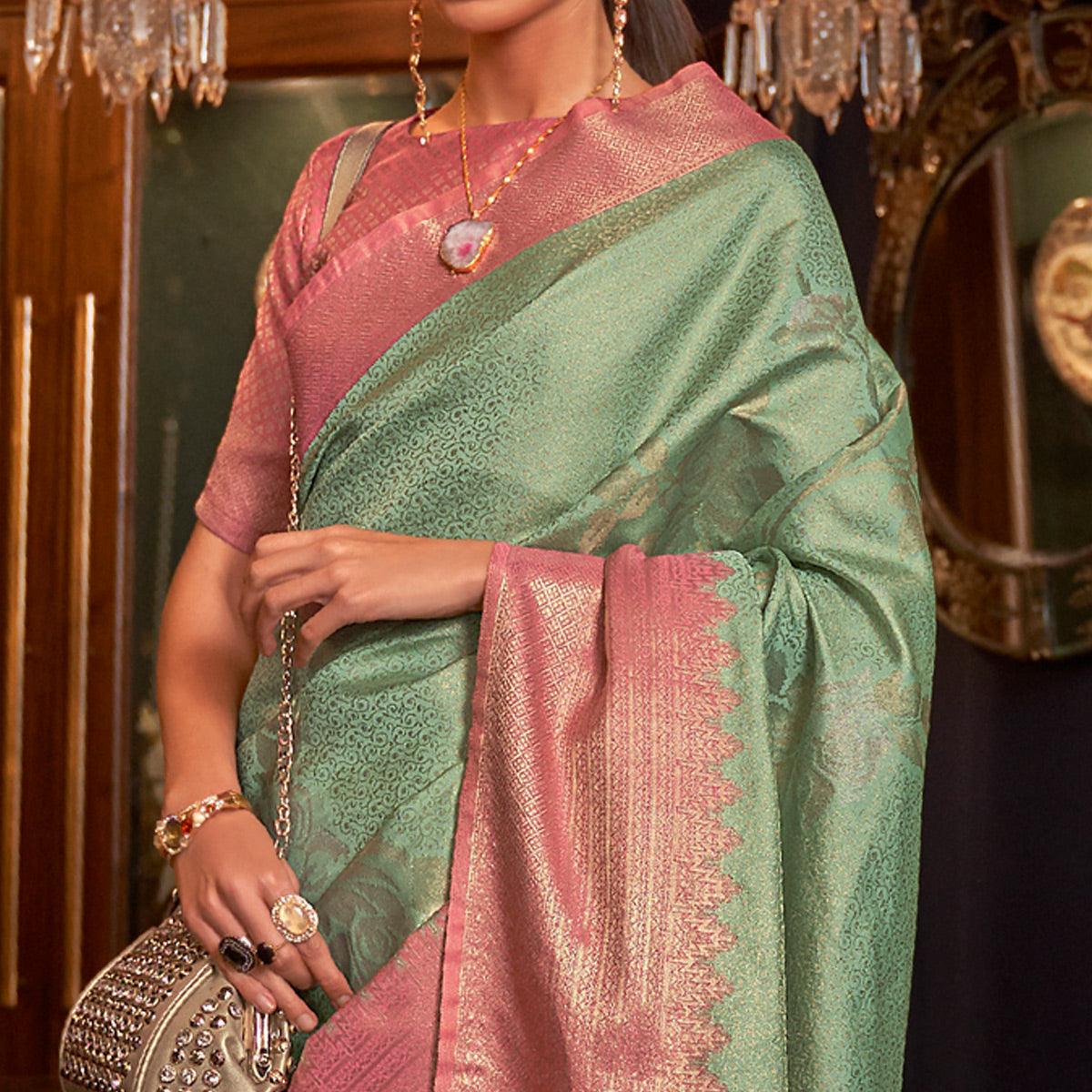 Green Woven Pure Silk Saree With Tassels - Peachmode