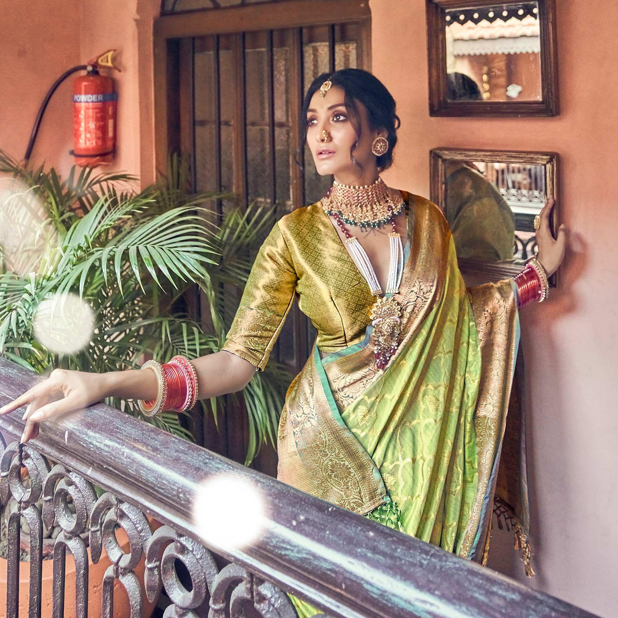 Green Woven Pure Silk Saree With Tassels - Peachmode
