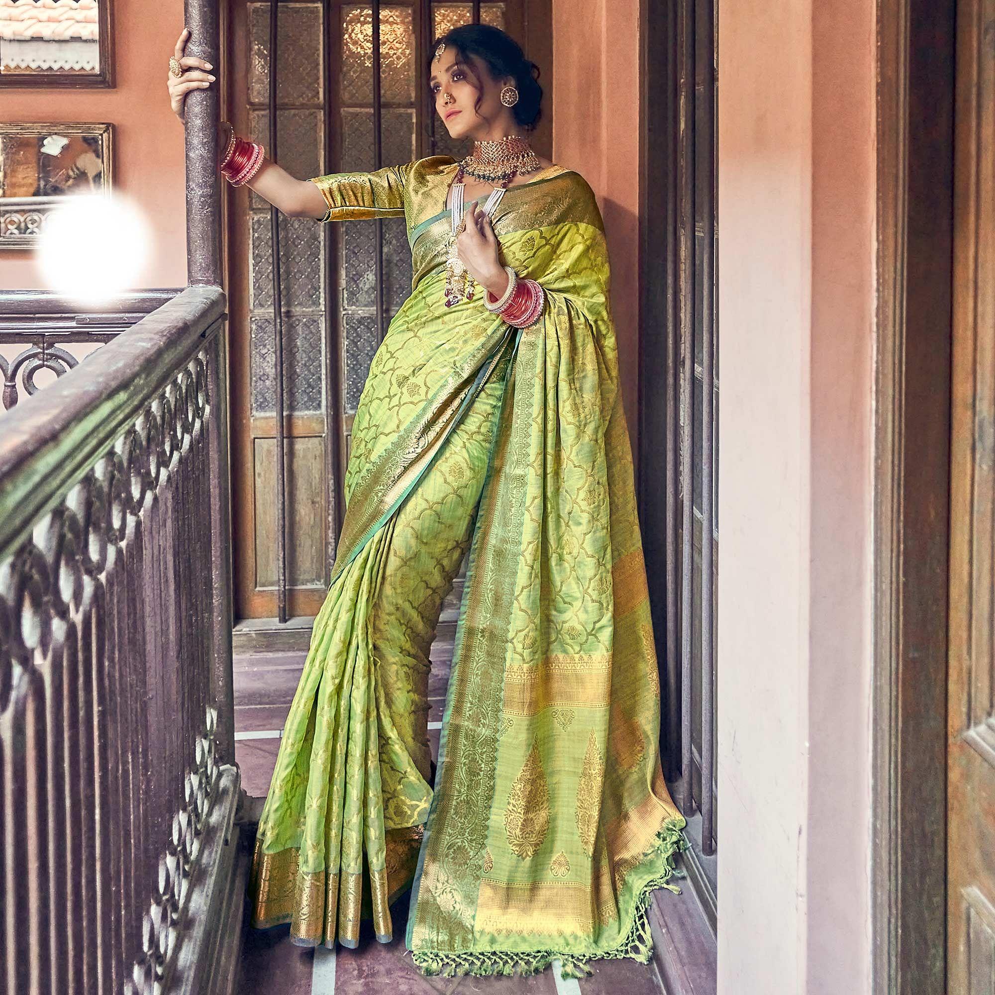 Green Woven Pure Silk Saree With Tassels - Peachmode